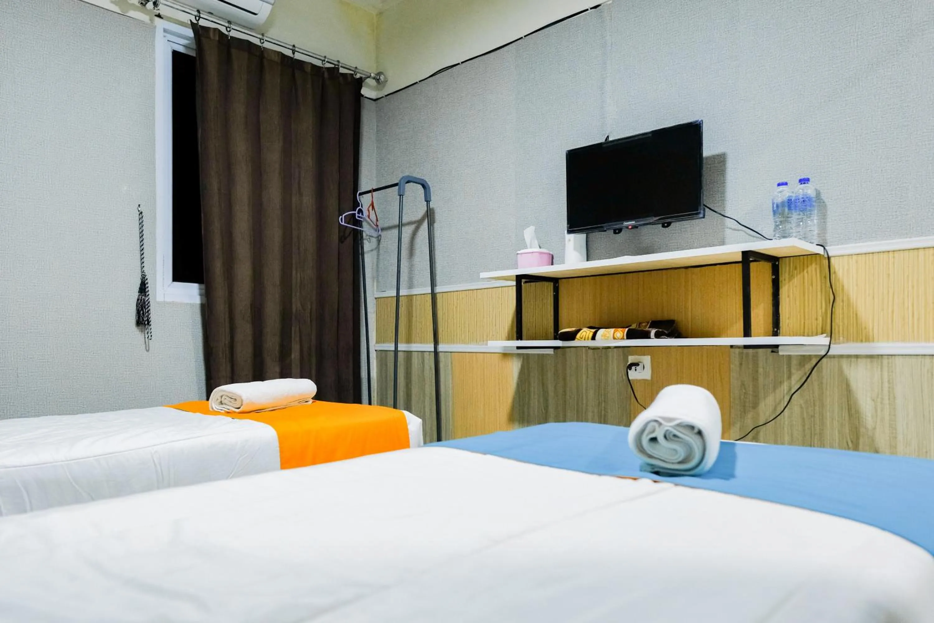 Bedroom, Bed in Sans Hotel Havila Bengkulu