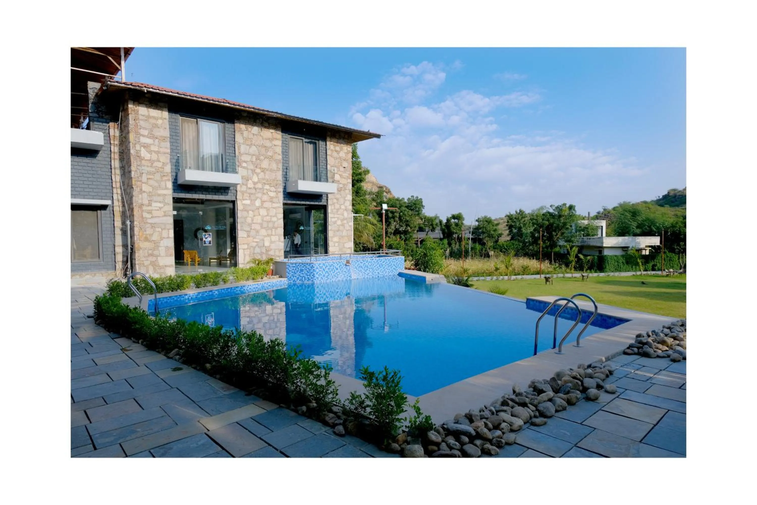 Property building, Swimming Pool in The Divine Hills Resort