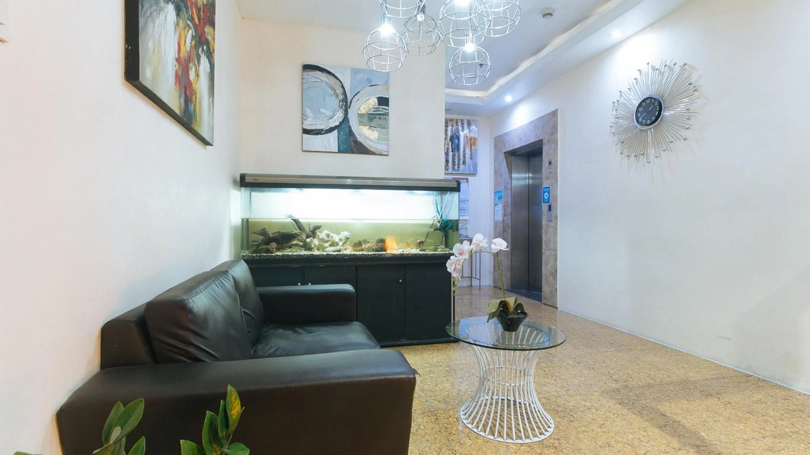 Living room in RedDoorz @ Melbourne Suites Makati