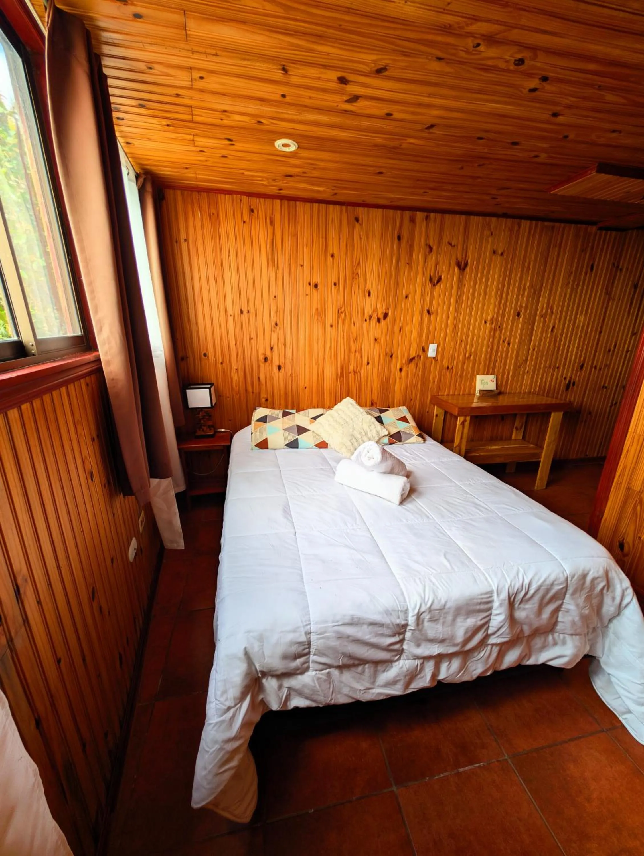 Bed in Miztli Lodge & Adventure