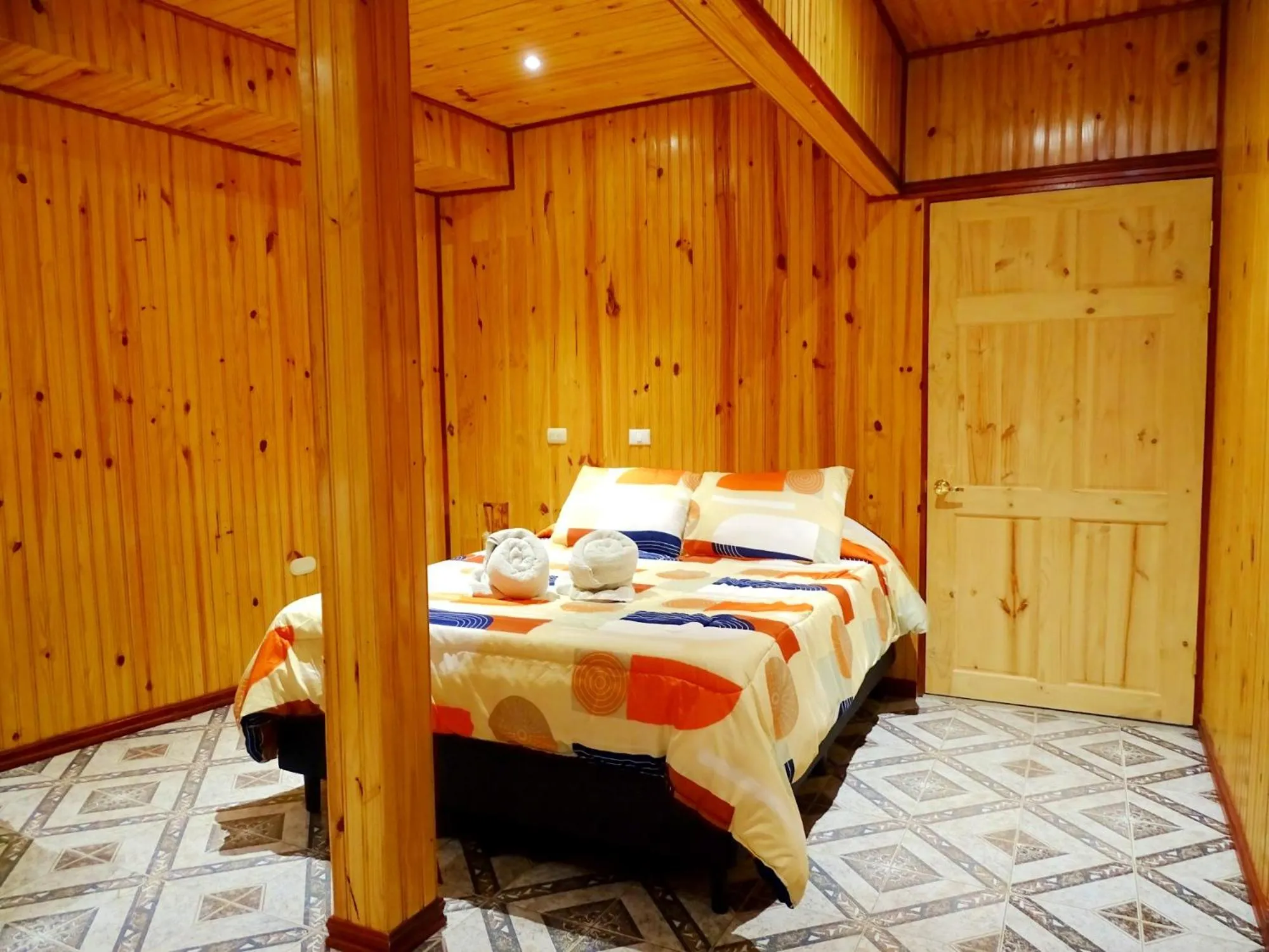 Bed in Miztli Lodge & Adventure
