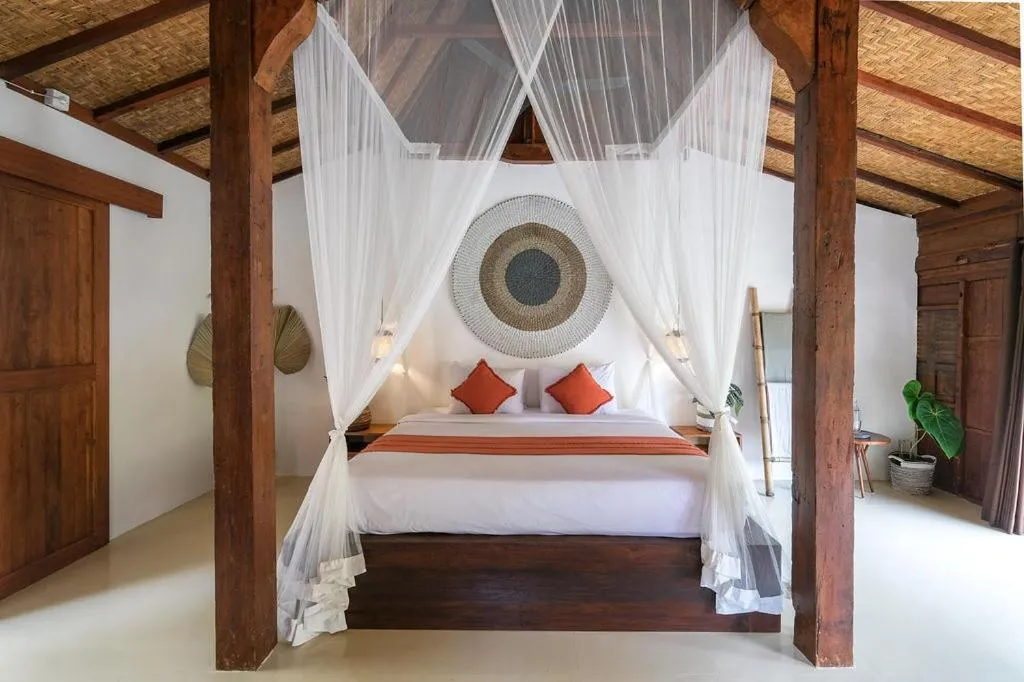 Bed in Kayu Mama Resort and Spa