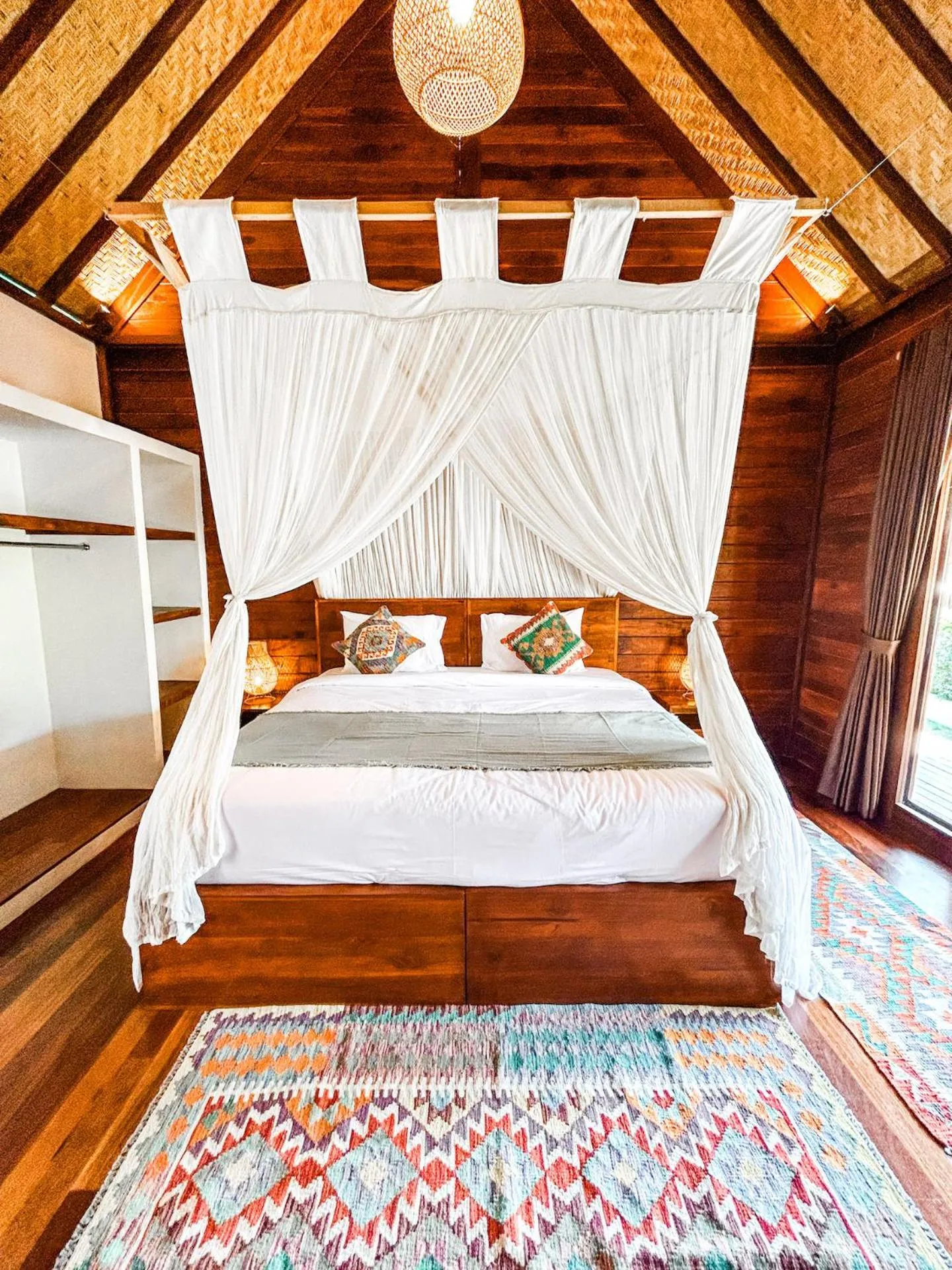Bed in Kayu Mama Resort and Spa