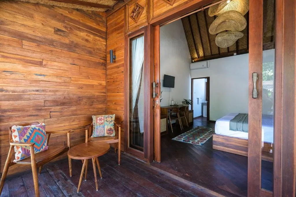 Bed in Kayu Mama Resort and Spa