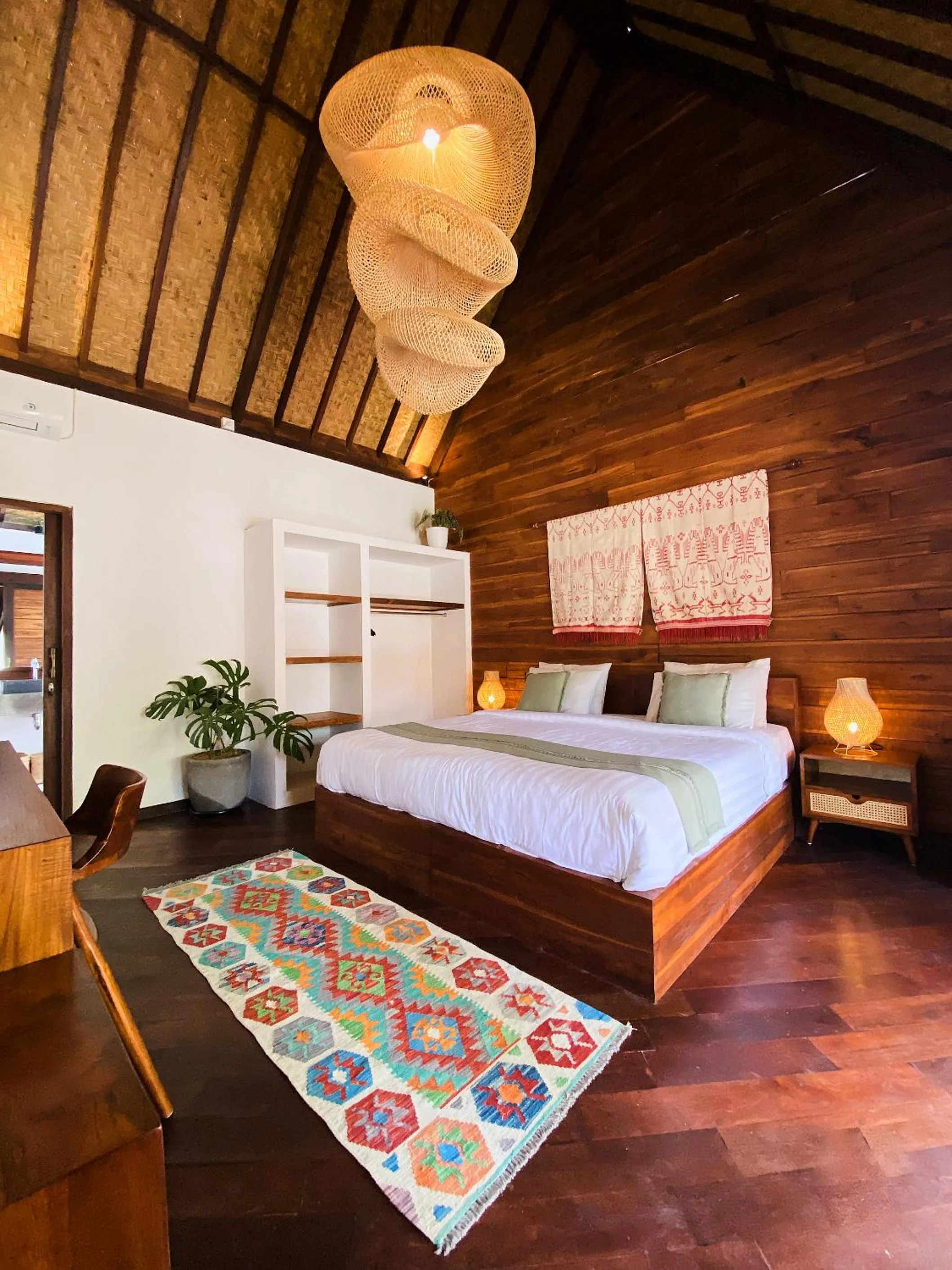 Bed in Kayu Mama Resort and Spa