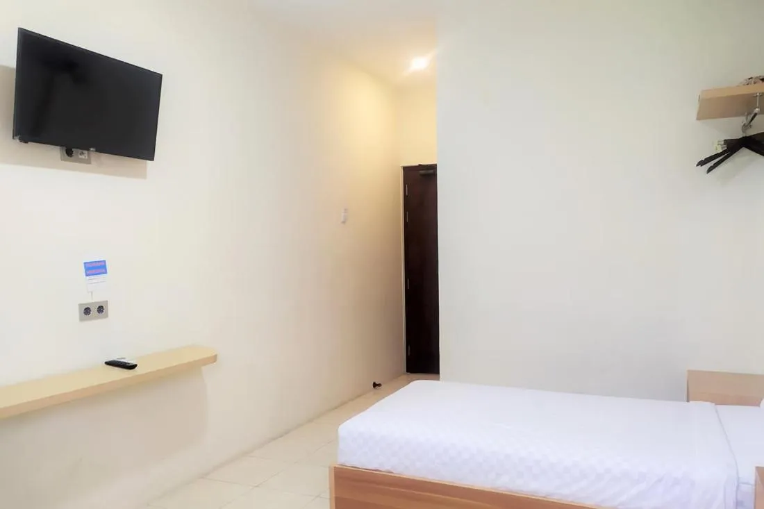 Bed in TwoSpaces Living at Residence 6