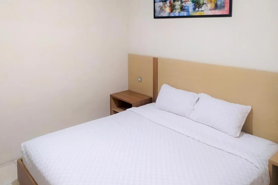 Bed in TwoSpaces Living at Residence 6