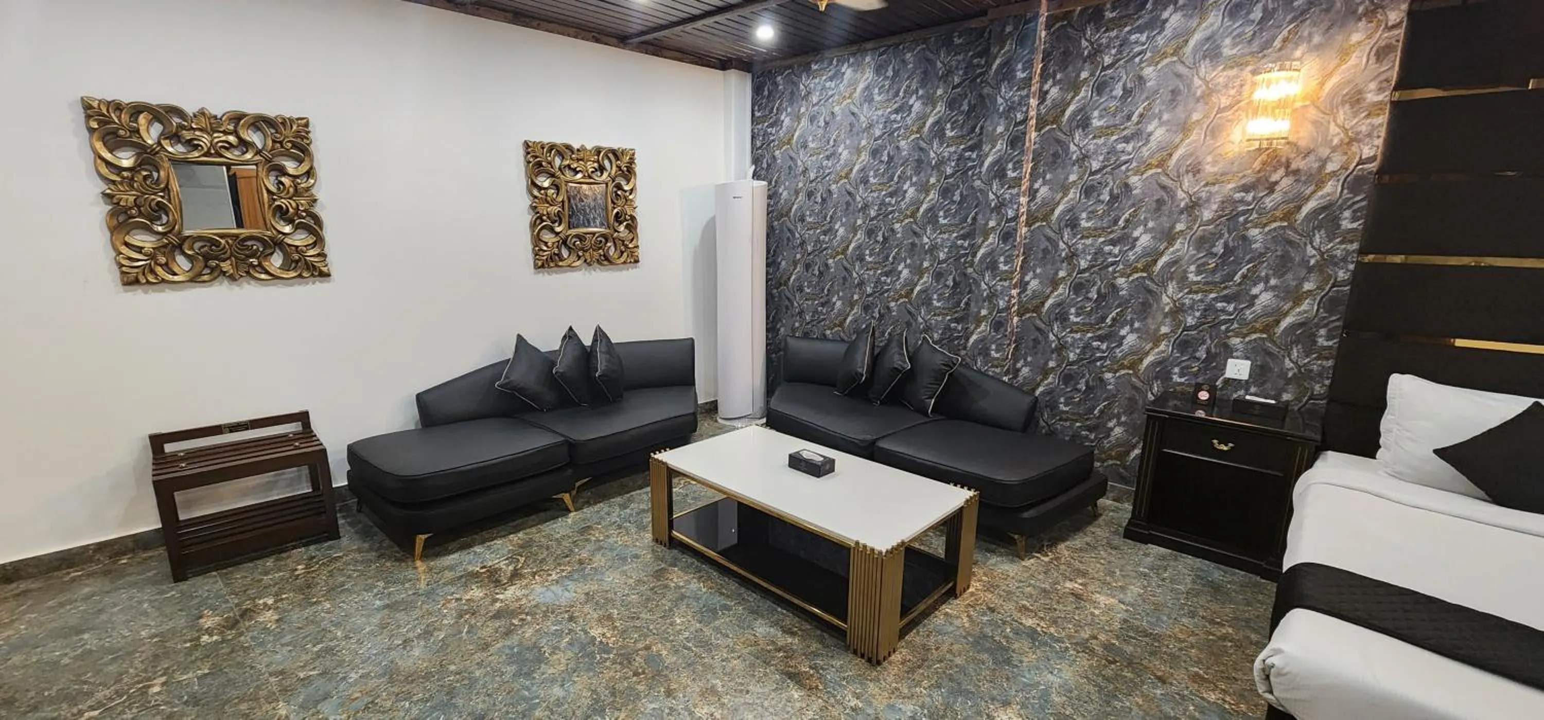 Seating area, Bed in Lawrence View Hotel, Lahore