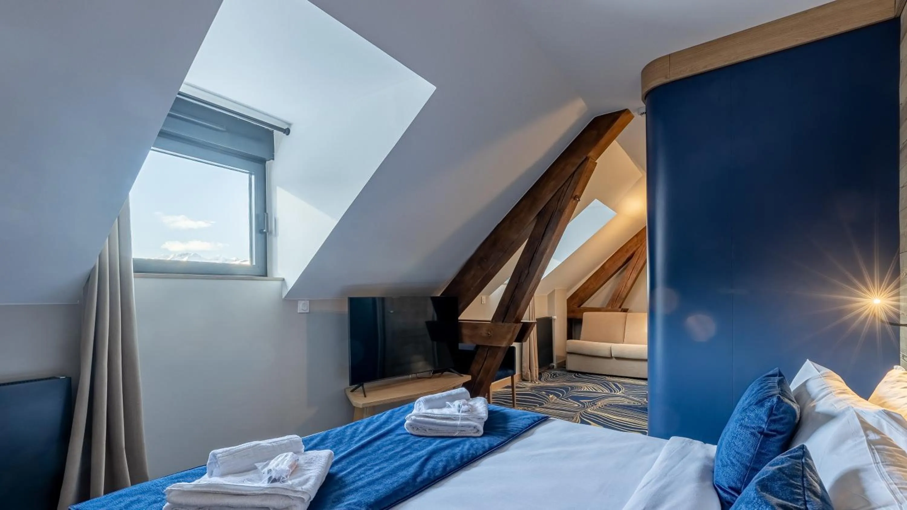 Bed in Madame Vacances Hotel Les Cimes