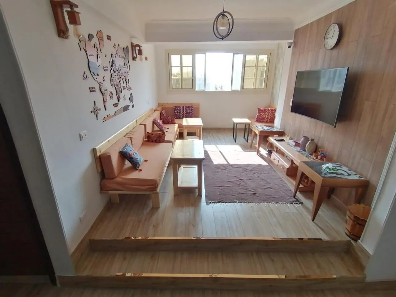 Communal lounge/ TV room in Champollion Hostel