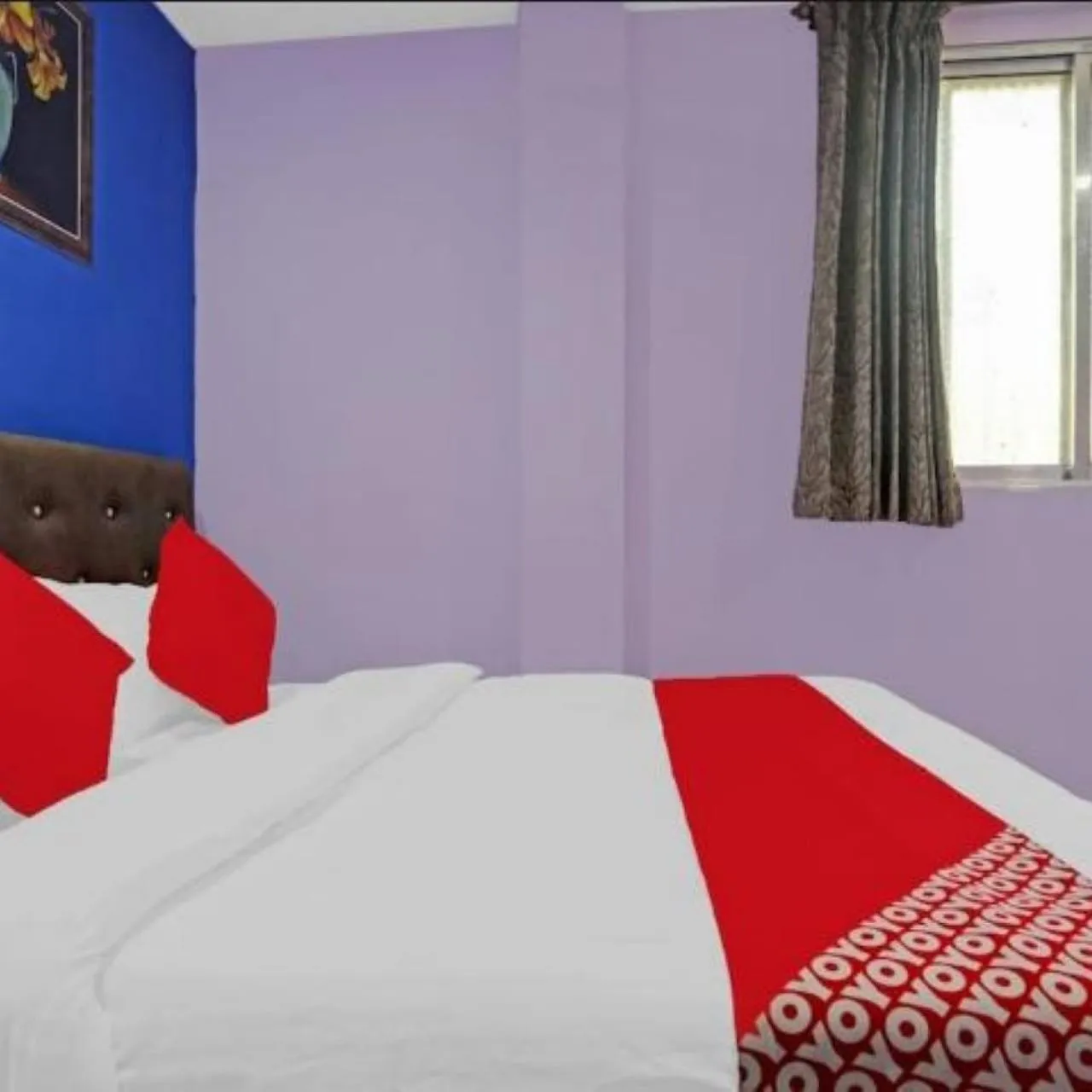 Bed in Hotel Welcome Inn,Mumbai