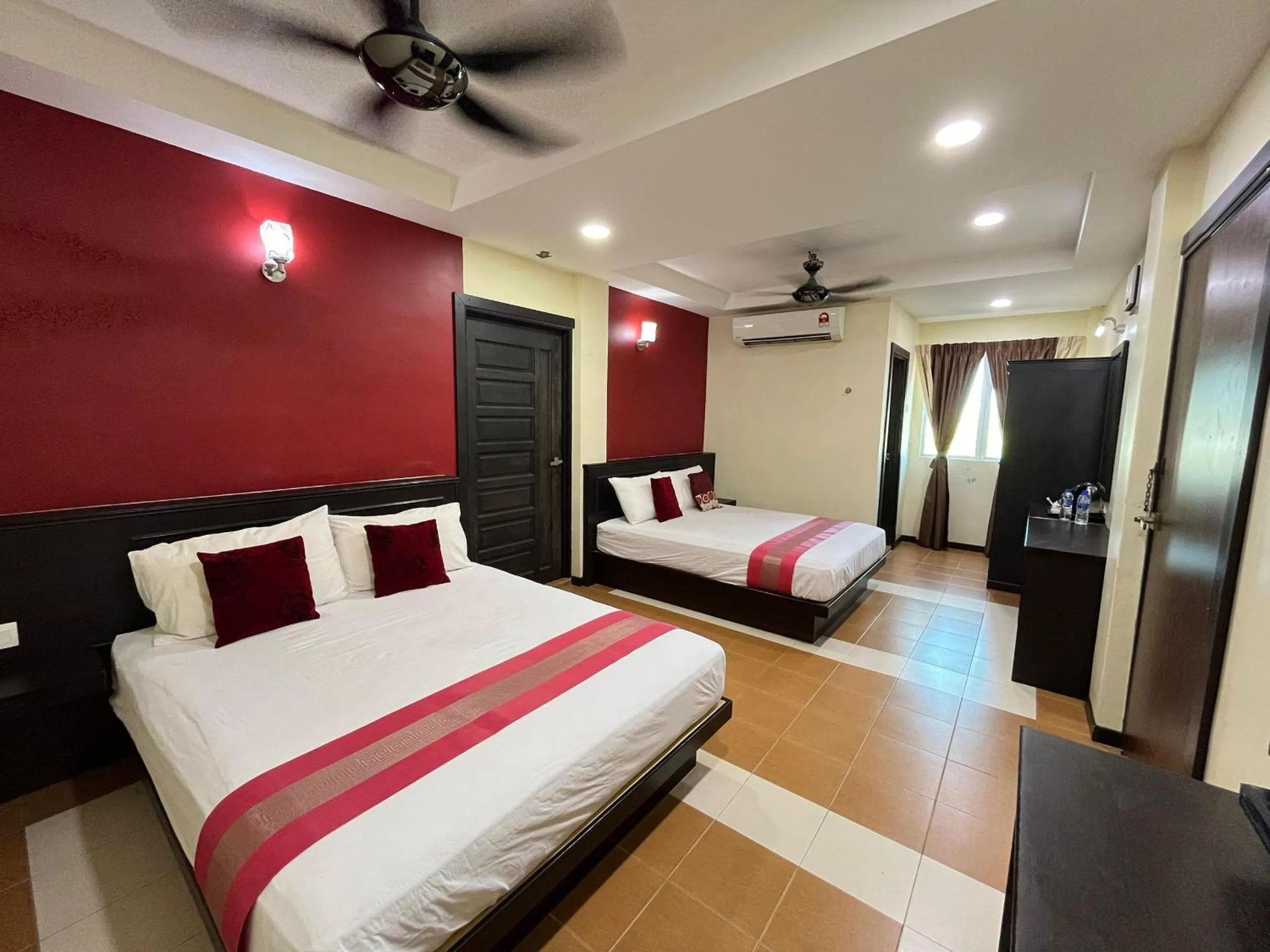 Bed in Sera Sentosa Inn