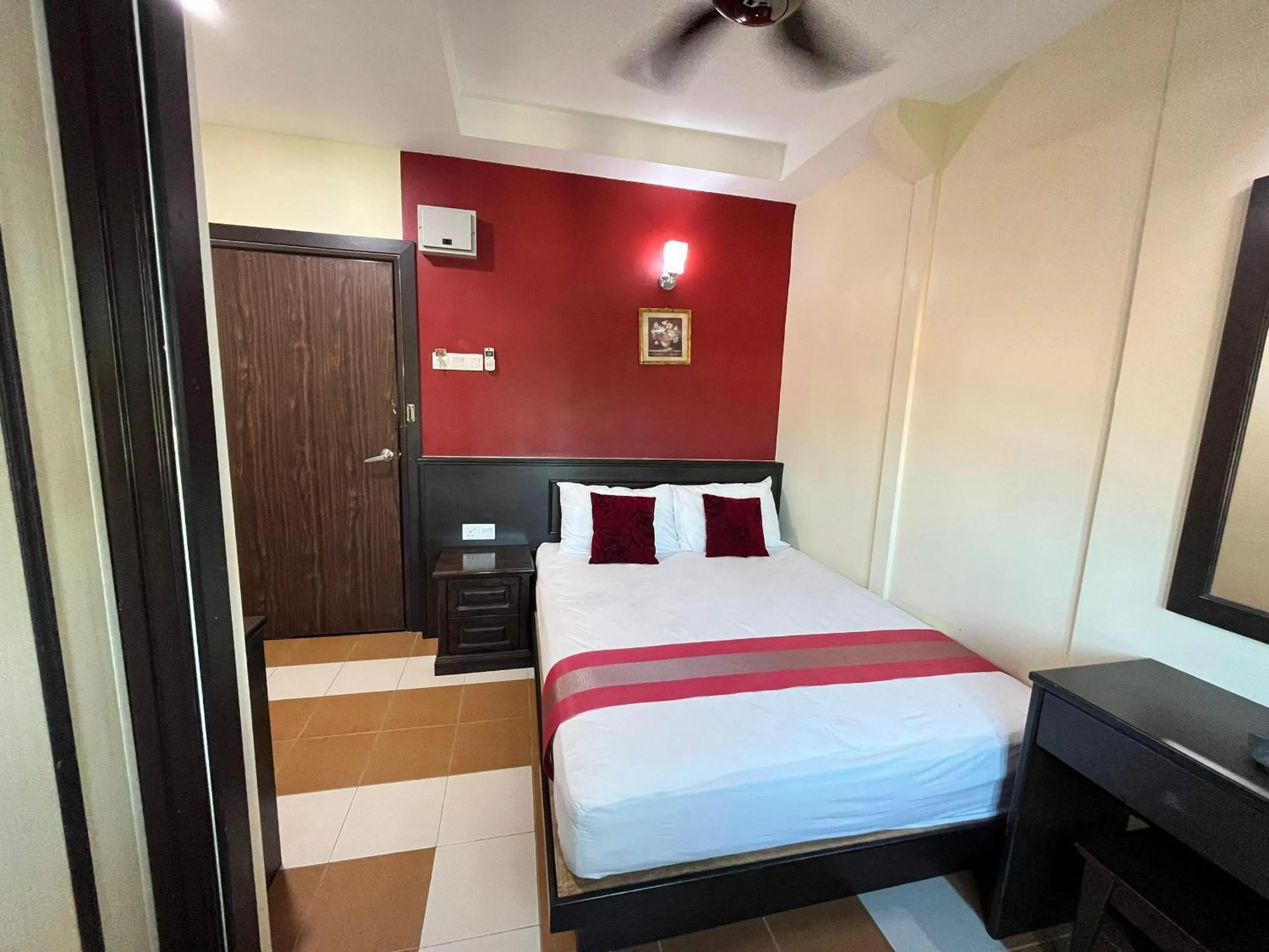 Bed in Sera Sentosa Inn