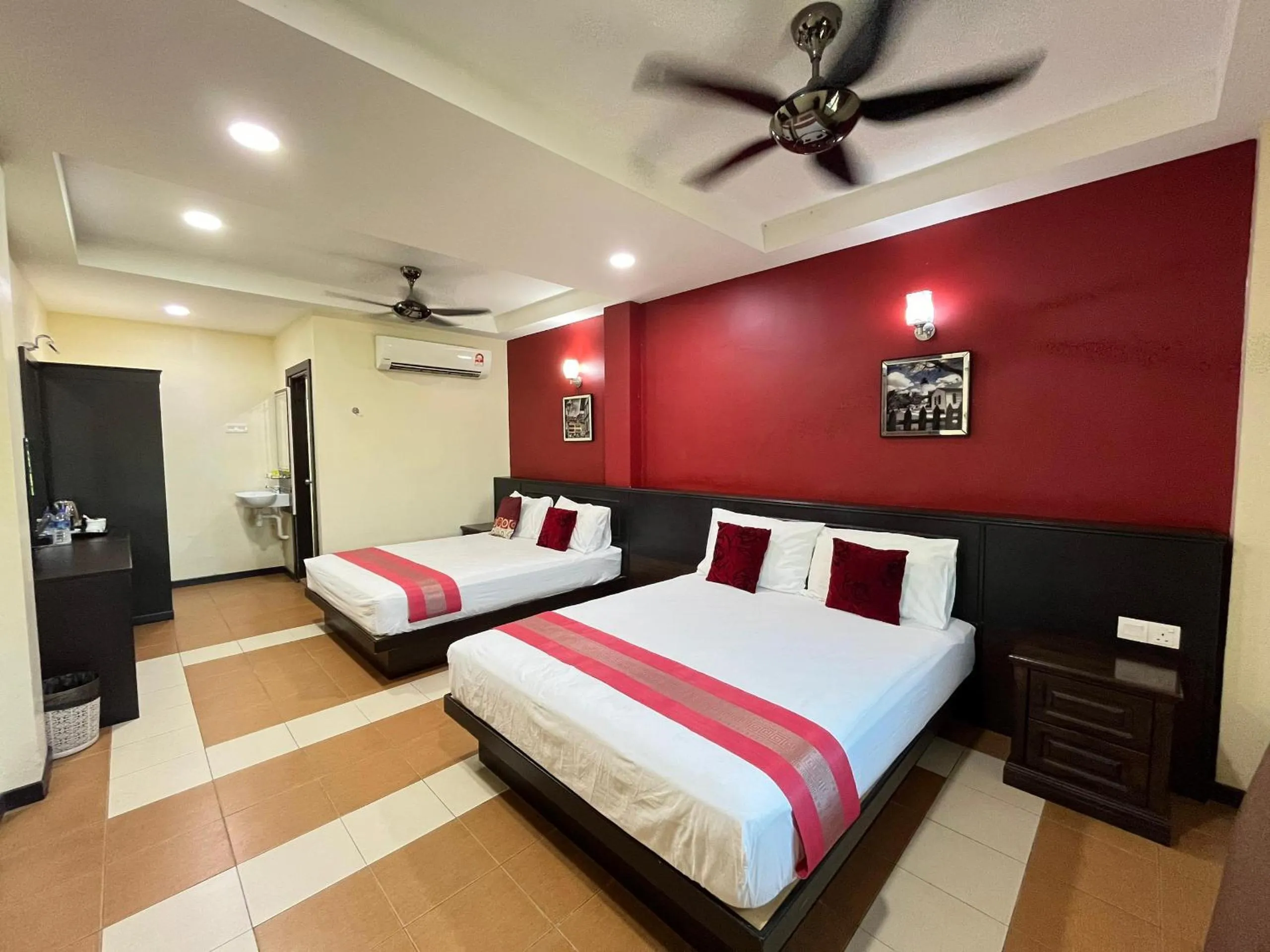 Bed in Sera Sentosa Inn