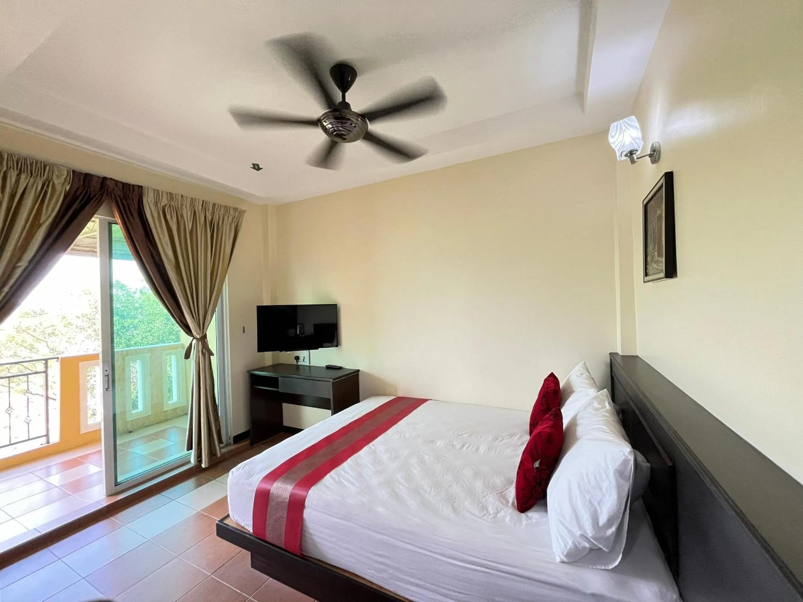 Bed in Sera Sentosa Inn