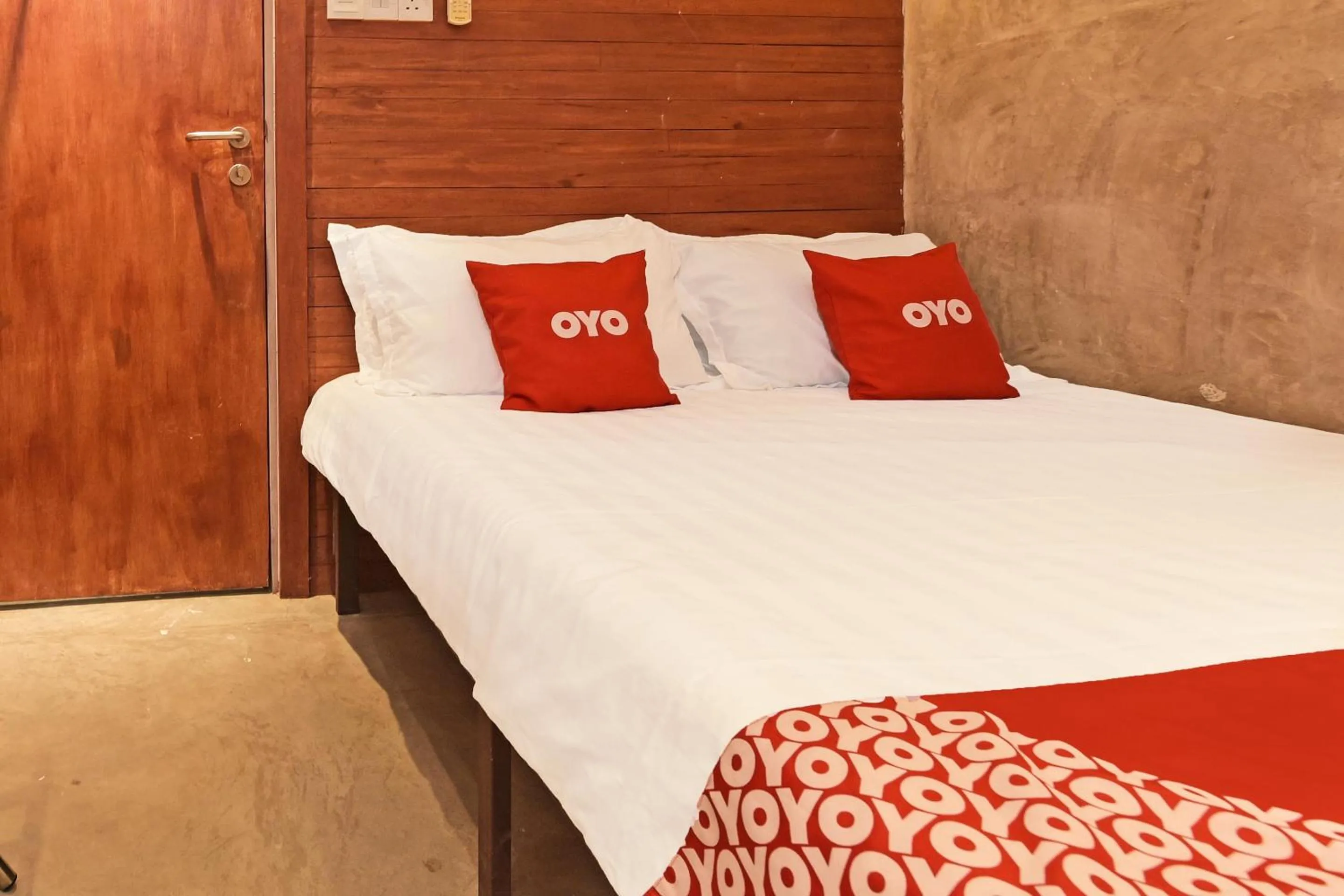 Bedroom in OYO 90662 The 1975 Hotel Empire