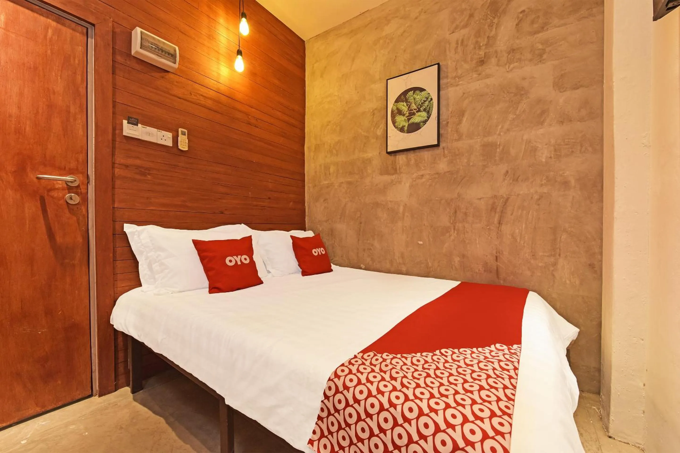 Bedroom in OYO 90662 The 1975 Hotel Empire