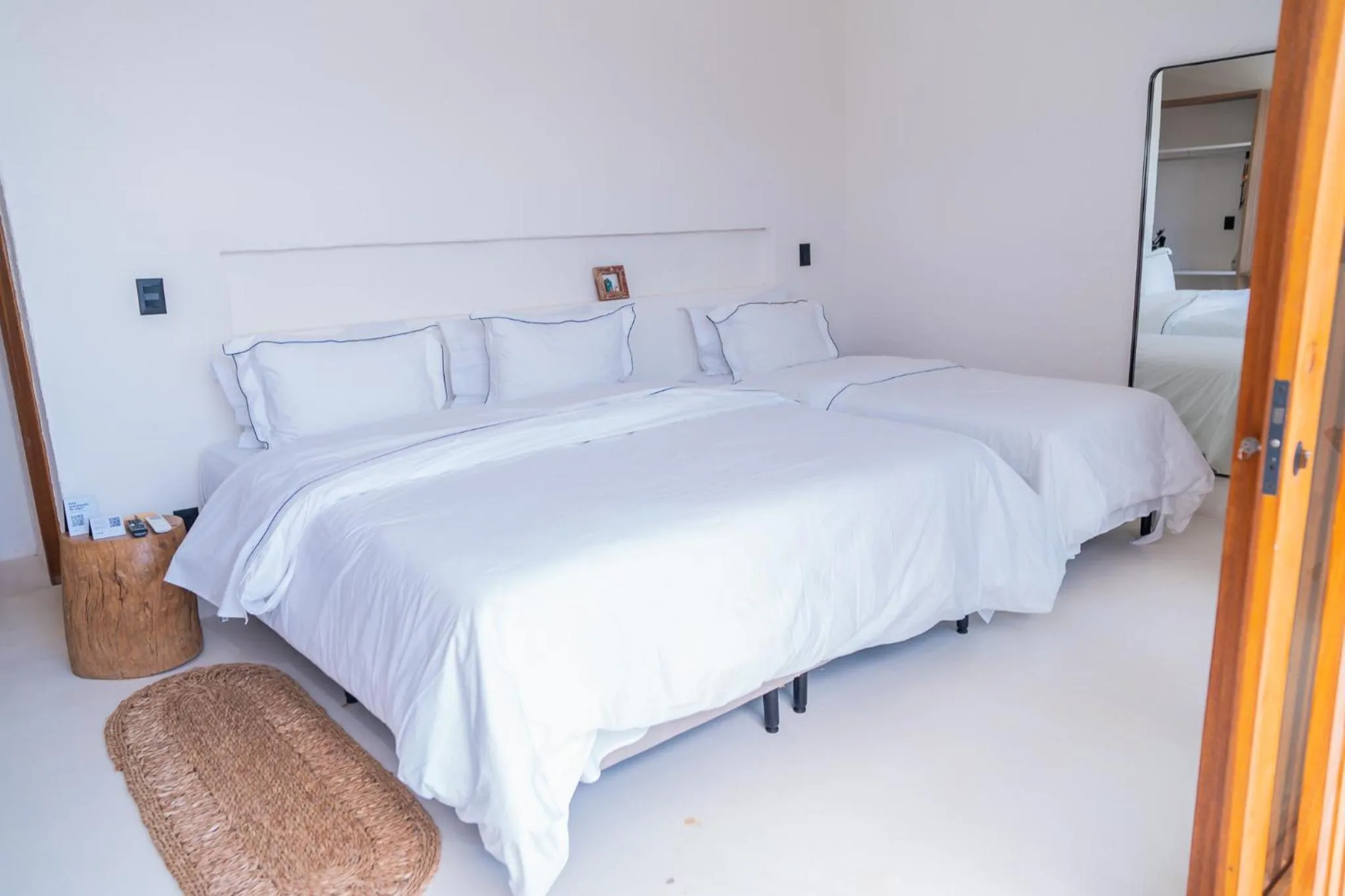 Bed in Mikiki Lifestyle Hotel