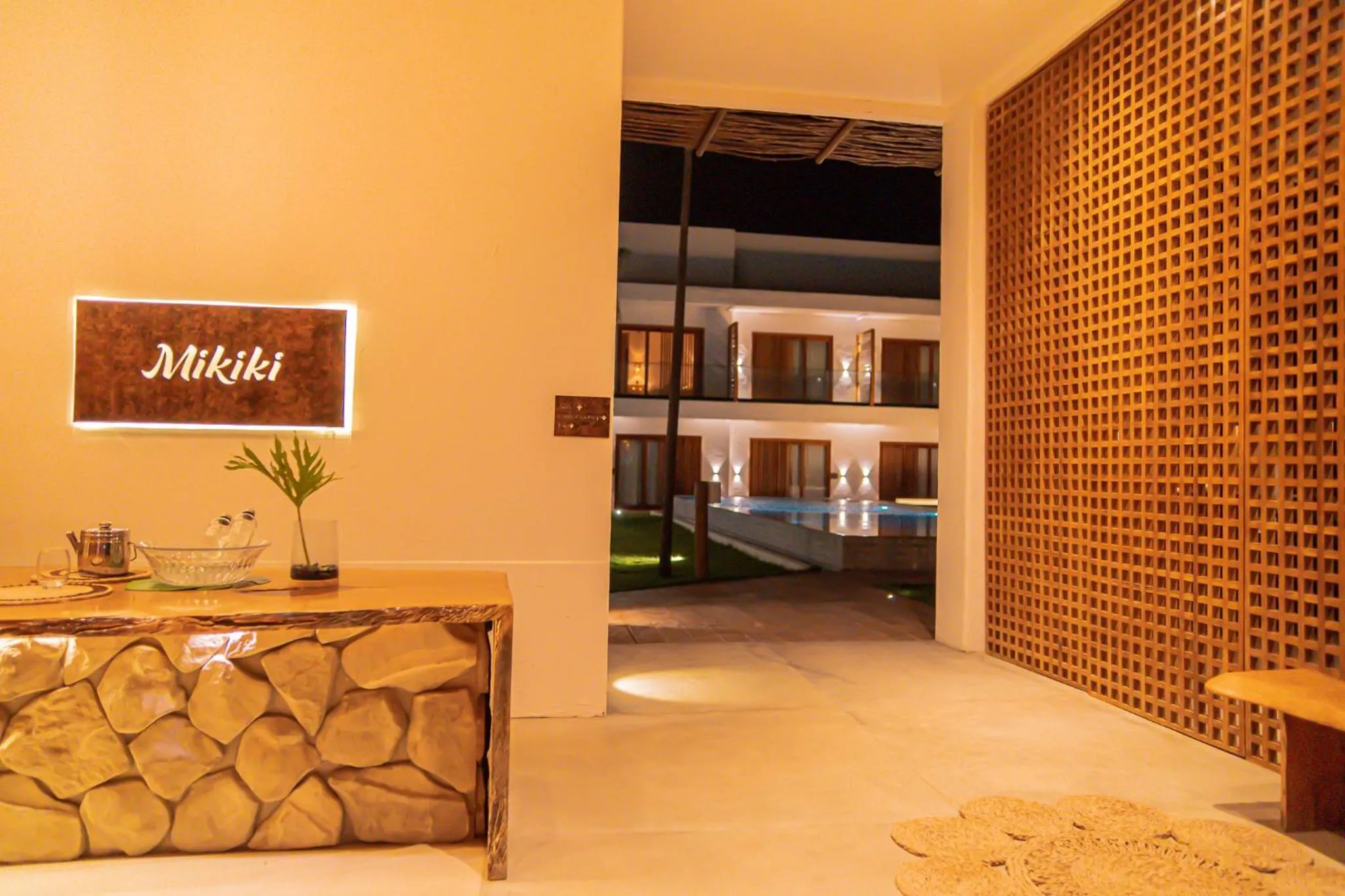 Property logo or sign in Mikiki Lifestyle Hotel