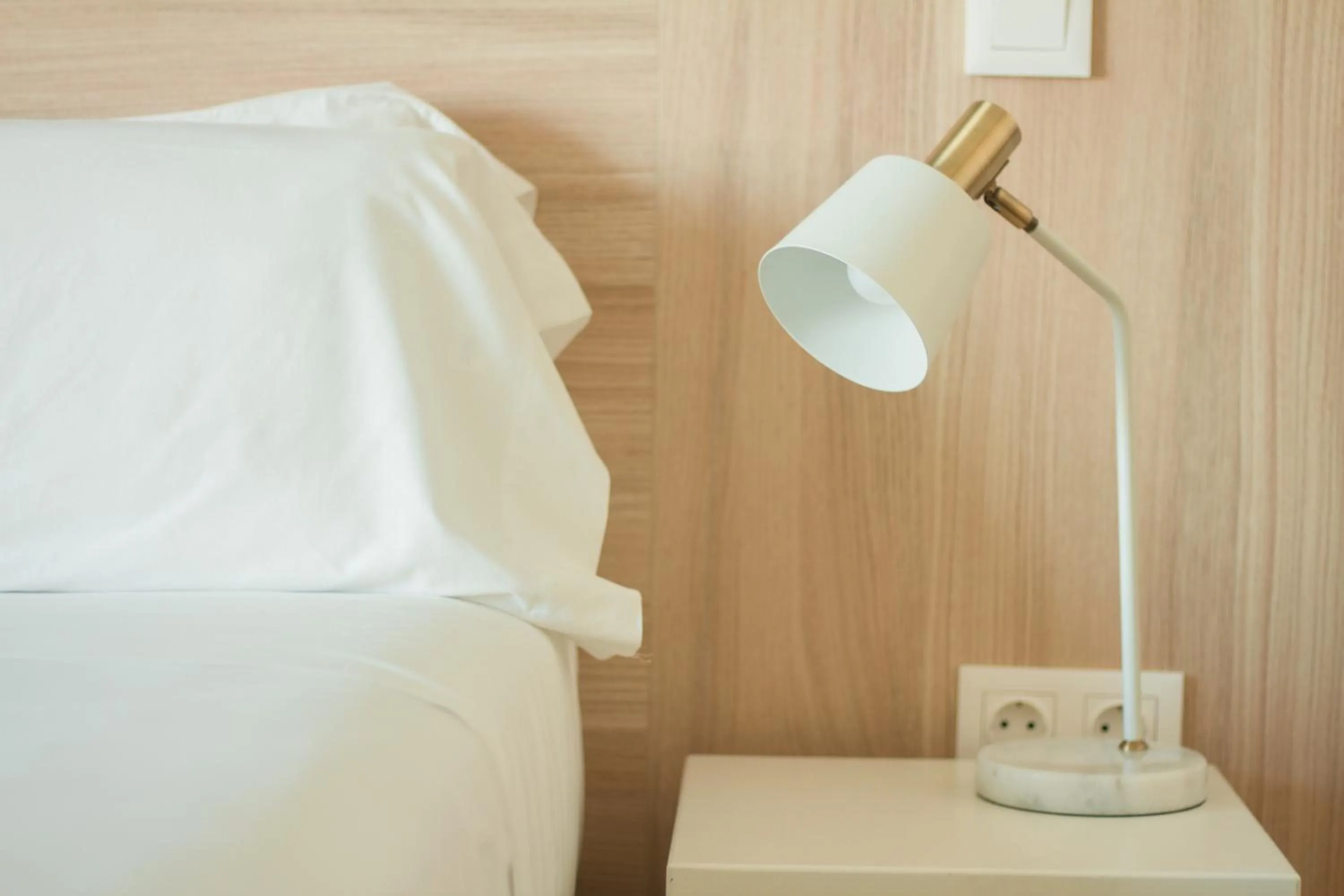 Decorative detail, Bed in room Select Porto Suites