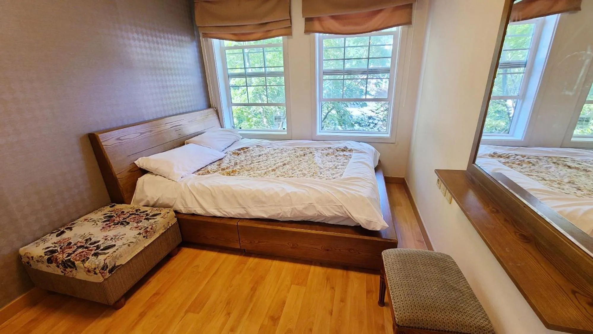 Bed in Elf Resort Hotel