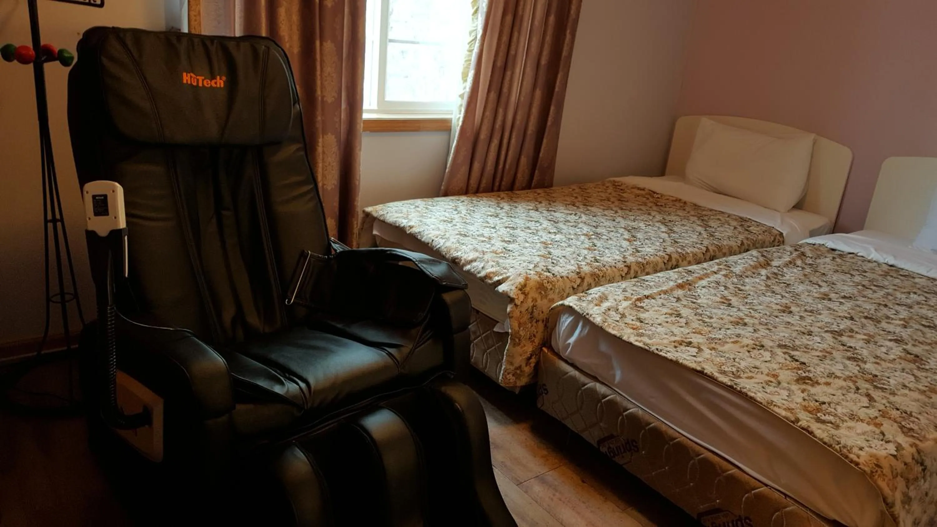 Bed in Elf Resort Hotel