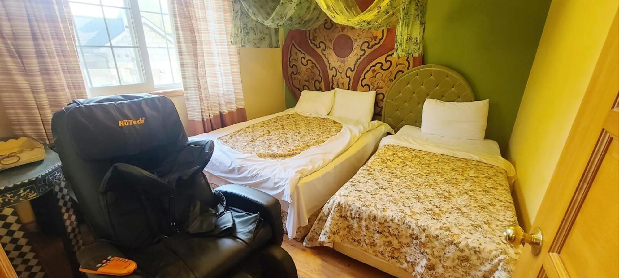 Bed in Elf Resort Hotel