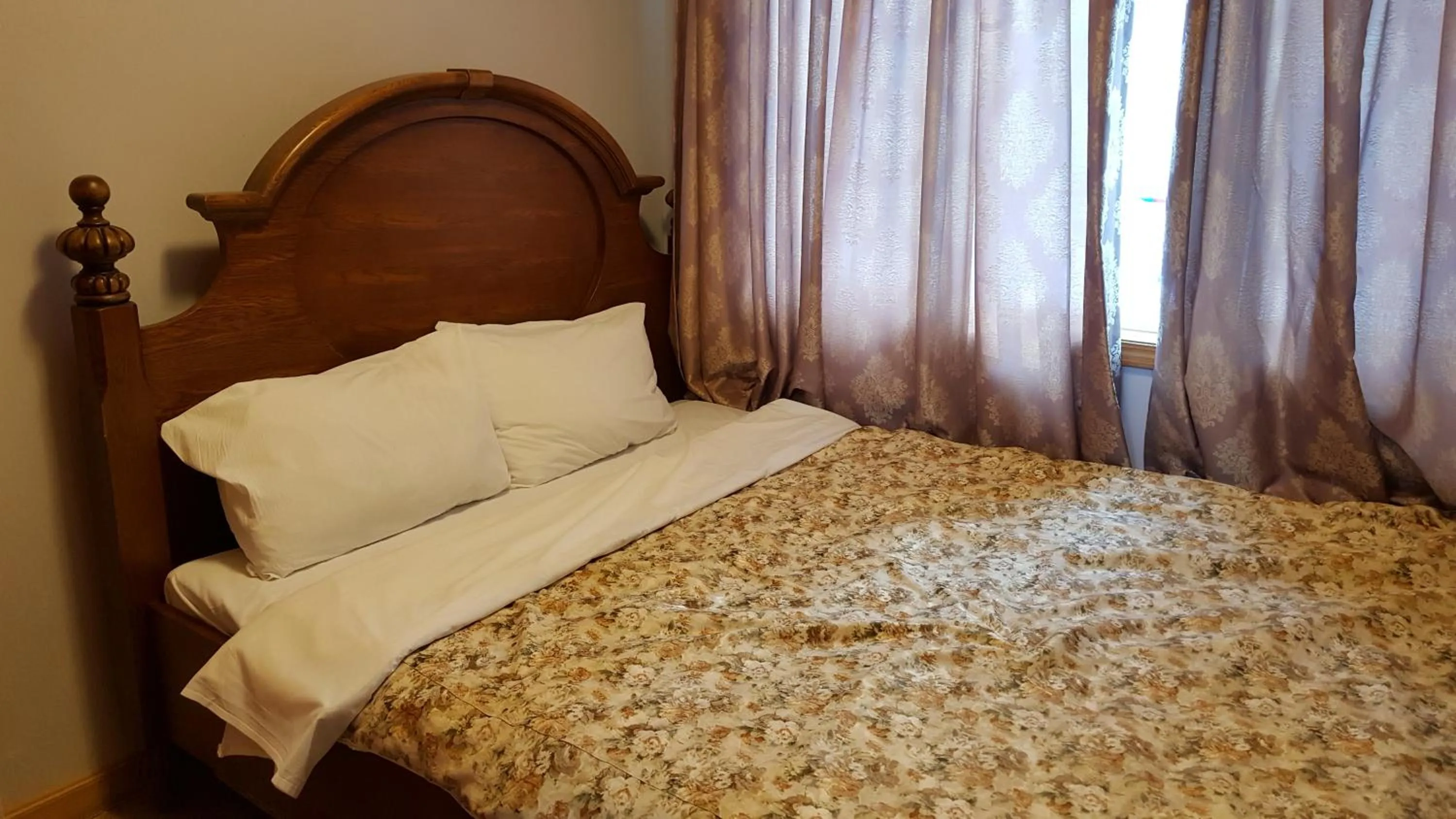 Bed in Elf Resort Hotel