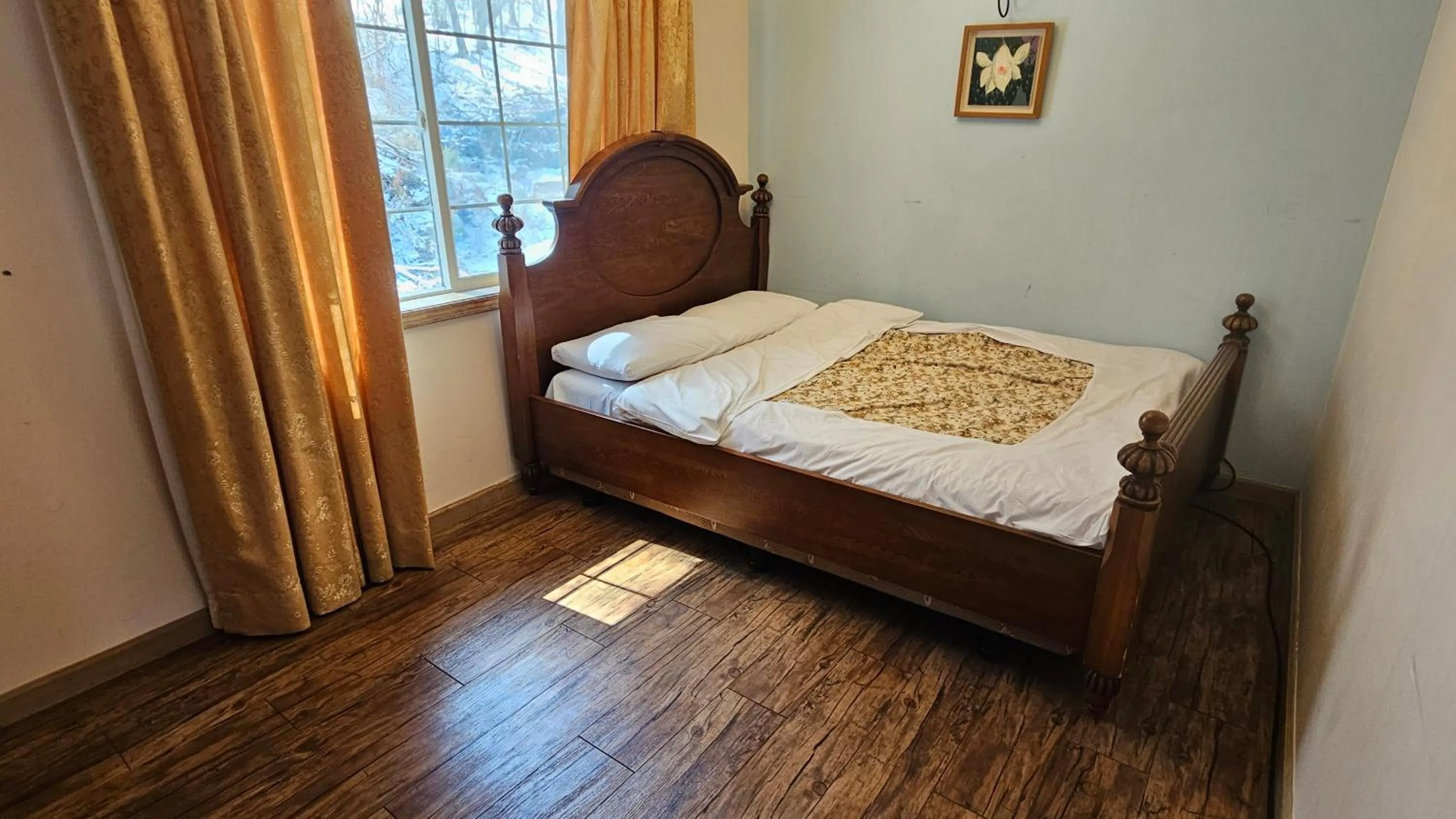 Bed in Elf Resort Hotel