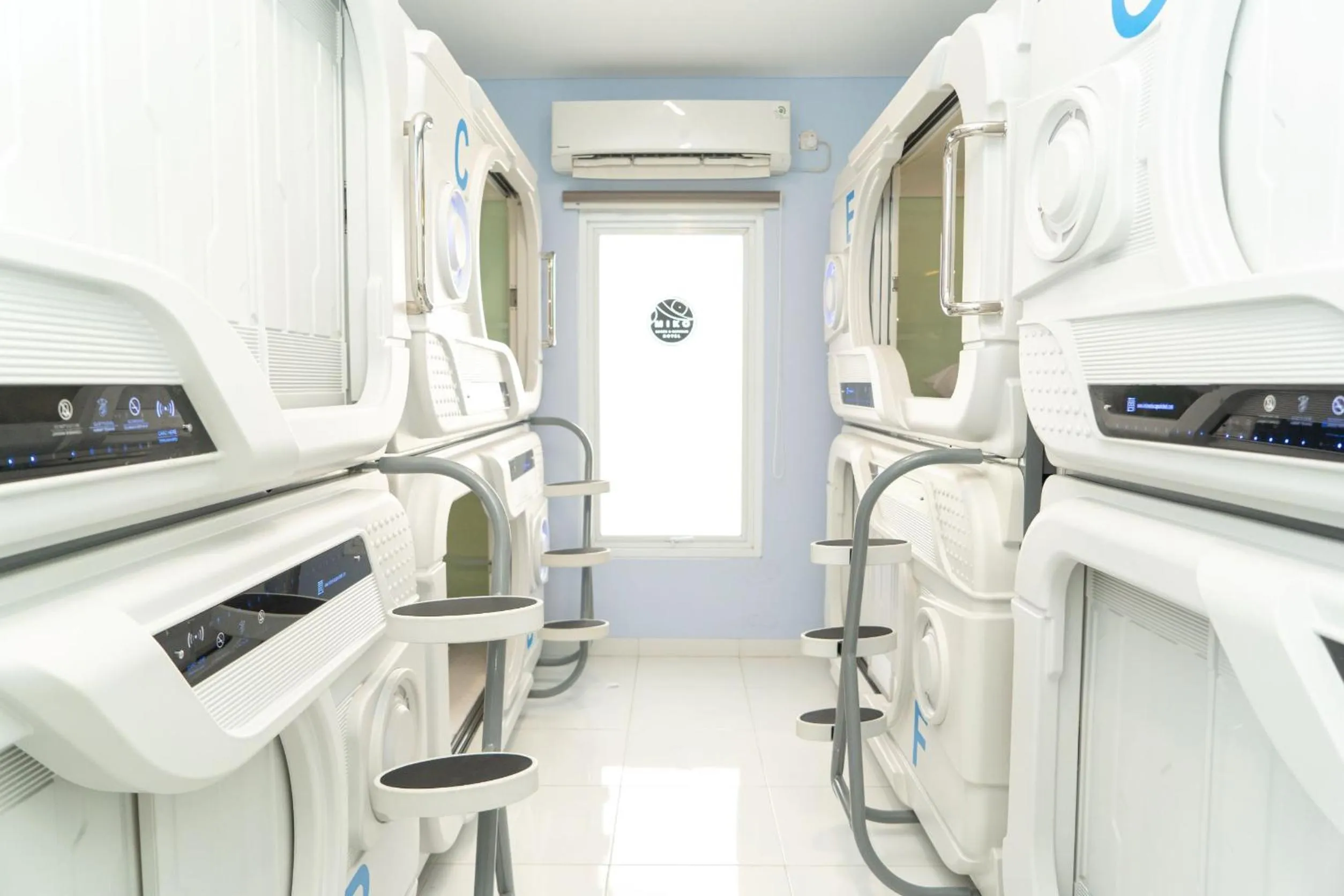 Bed in Miko Rooms & Capsules hotel