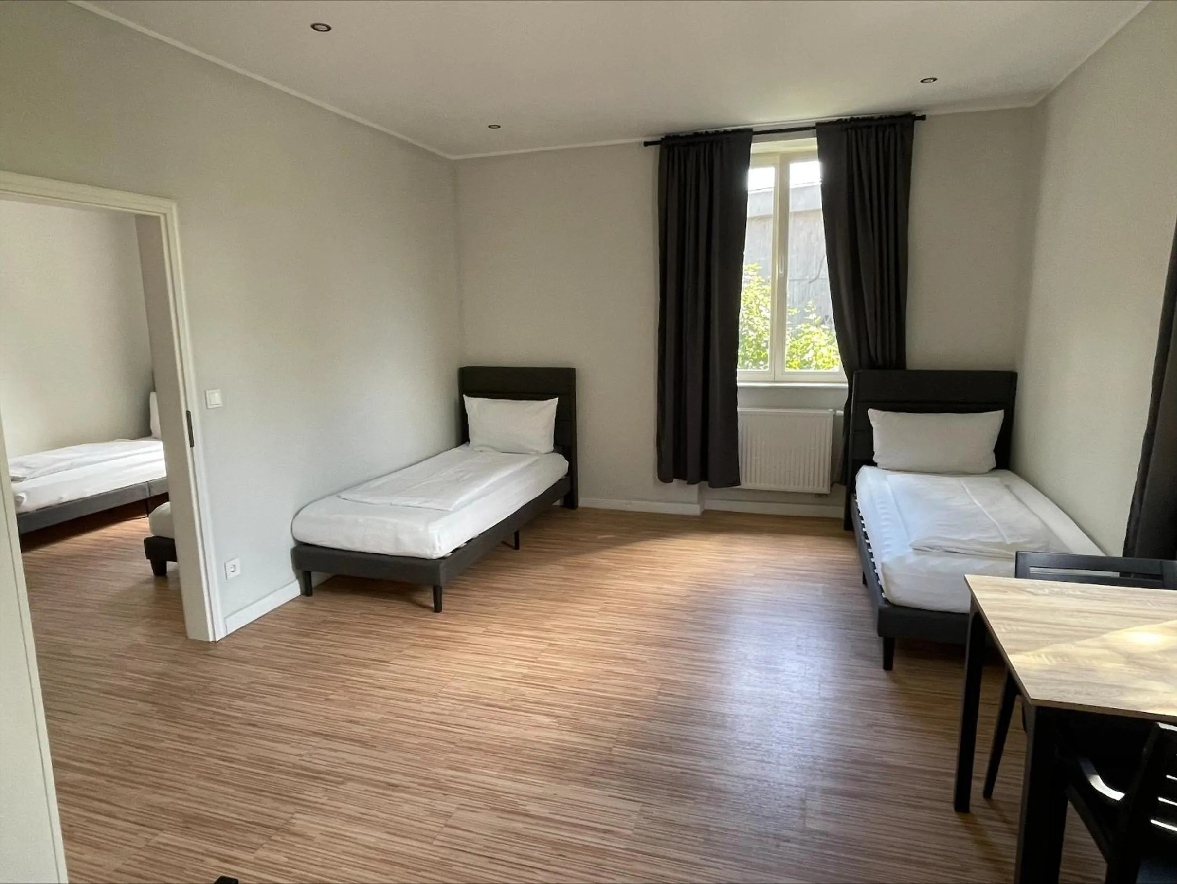 Seating area, Bed in Ahoi Hostel