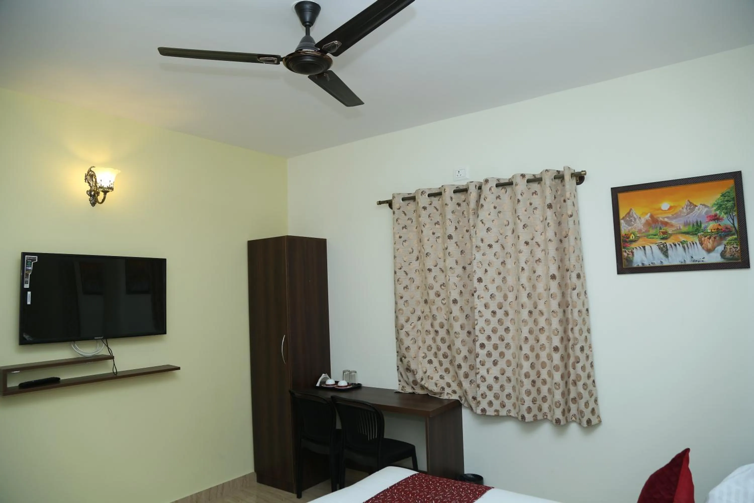 TV and multimedia in Hotel Bangalore Airport Inn, Near kempegowda Airport, Airport Pickup & Drop Available 24X7