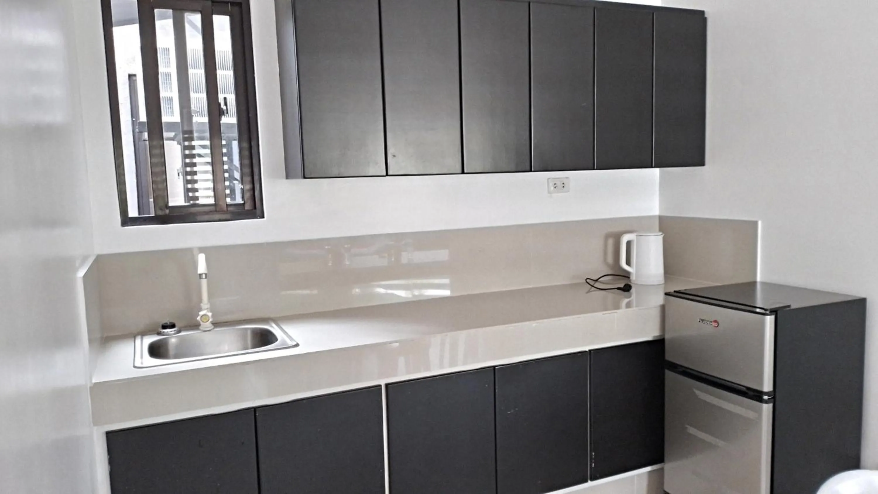 Kitchen or kitchenette in Maria Cristesa Condotel