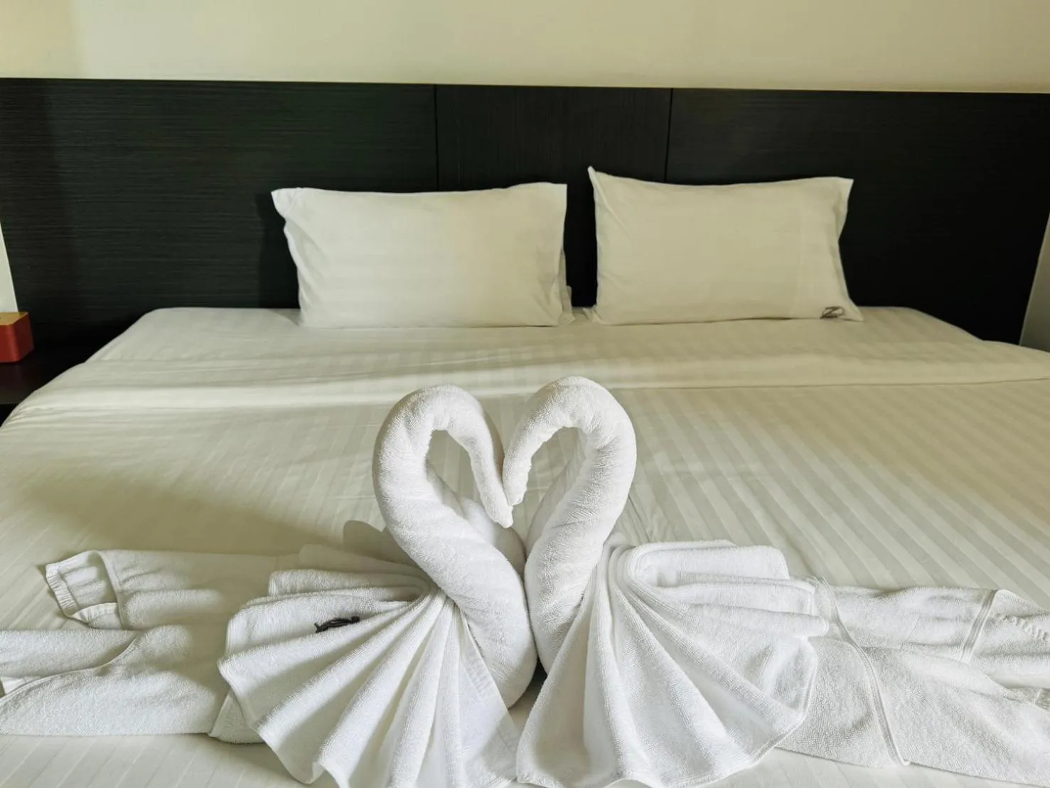 Bed in 77 Patong Hotel & Spa