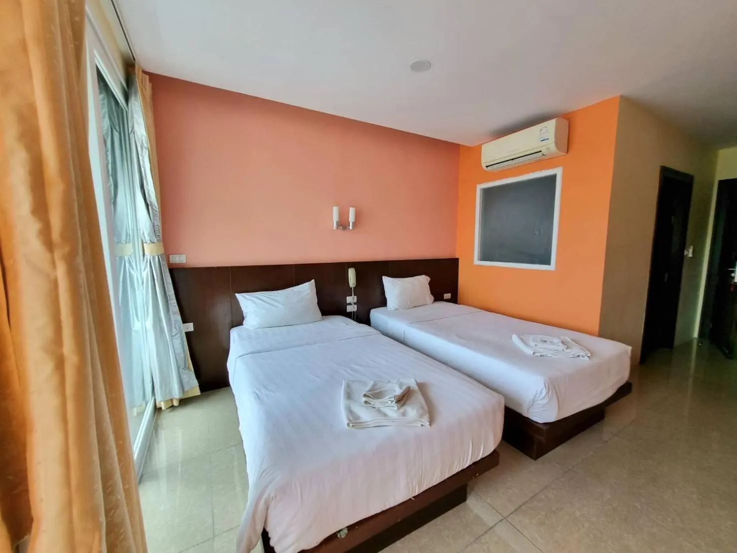 Bed in 77 Patong Hotel & Spa