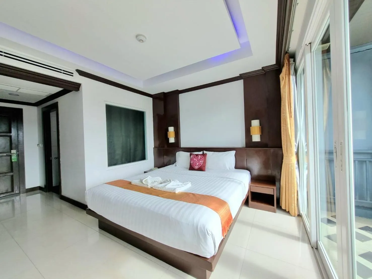 Bed in 77 Patong Hotel & Spa