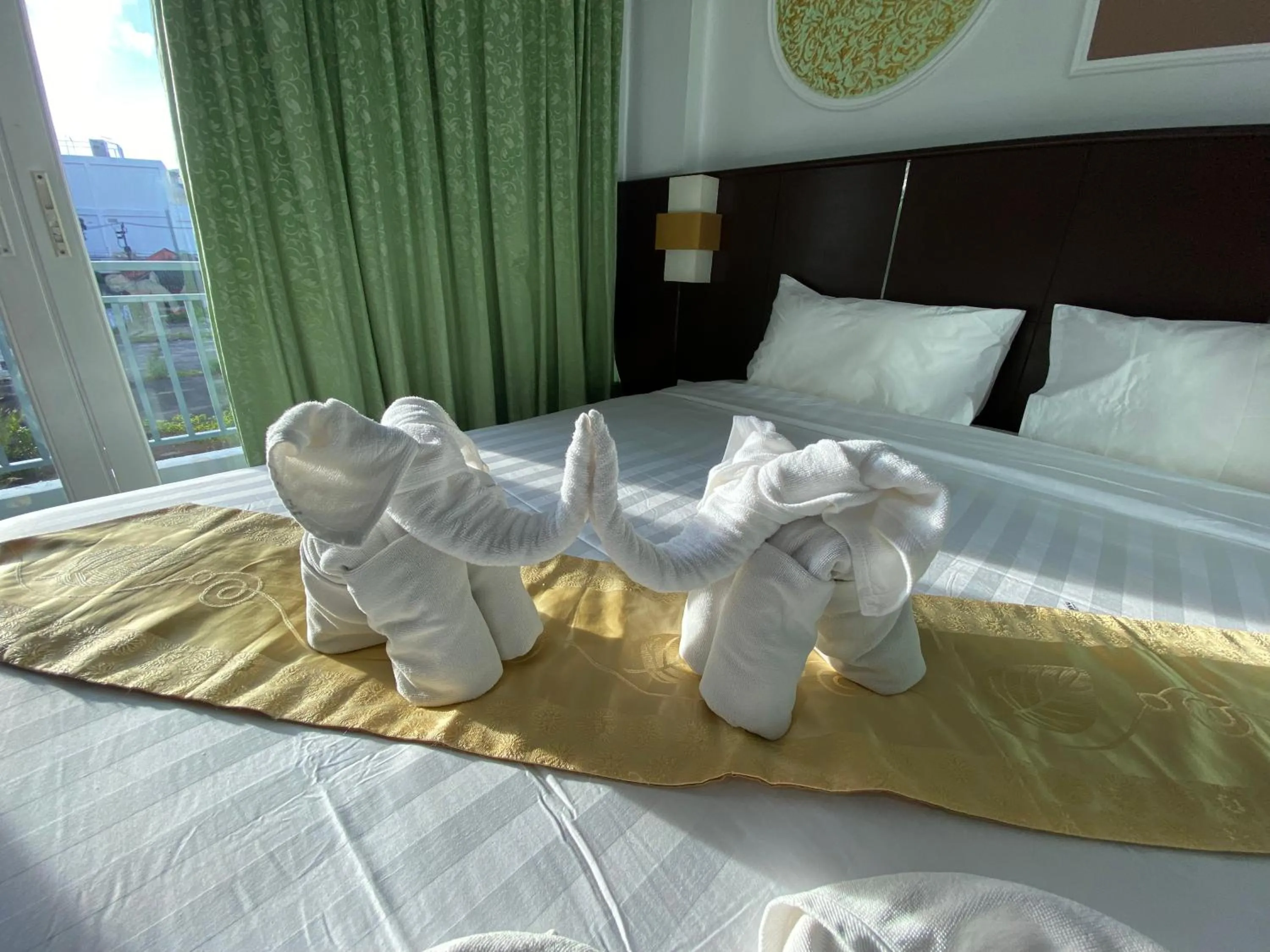 Bed in 77 Patong Hotel & Spa