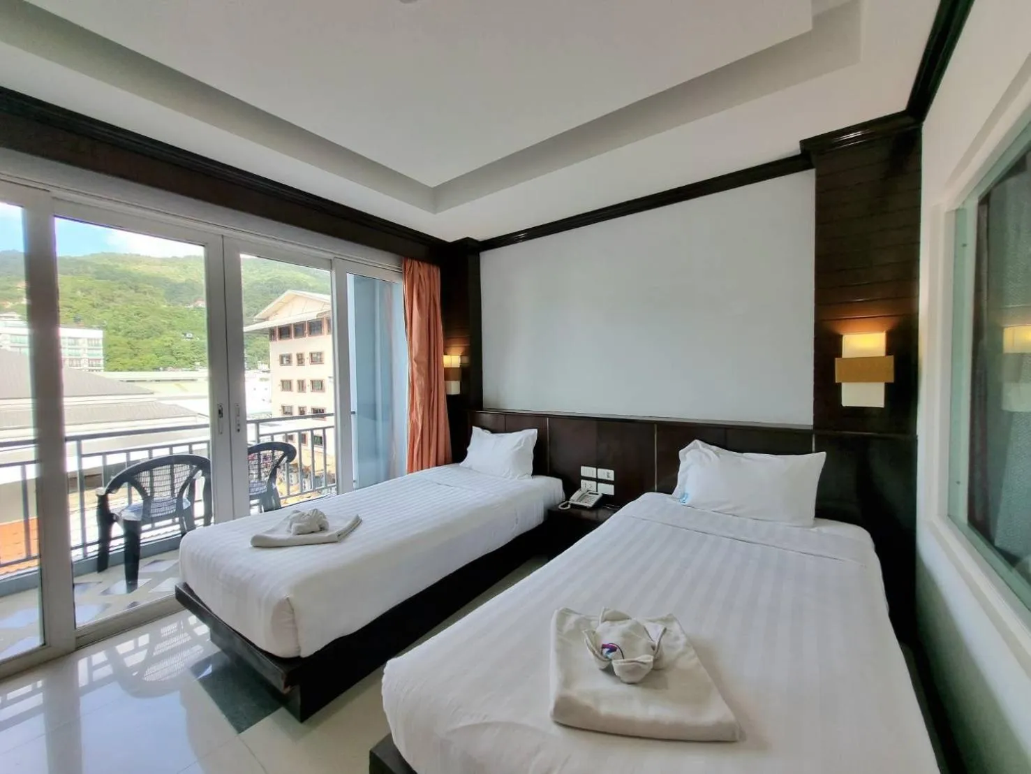 Bed in 77 Patong Hotel & Spa