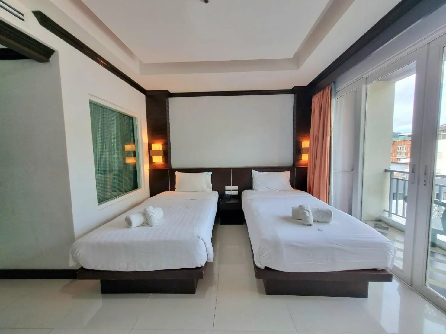Bed in 77 Patong Hotel & Spa