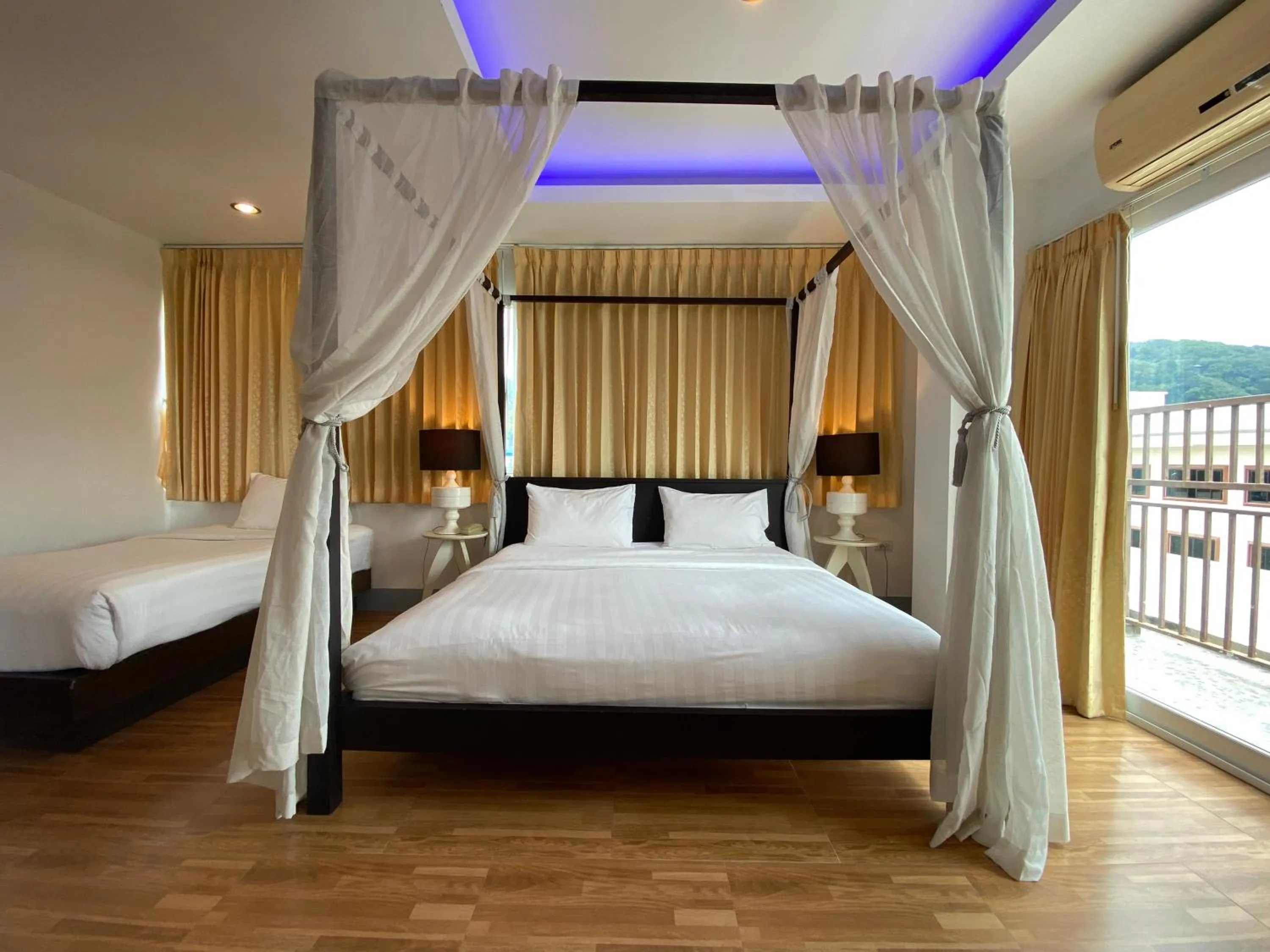 Bed in 77 Patong Hotel & Spa