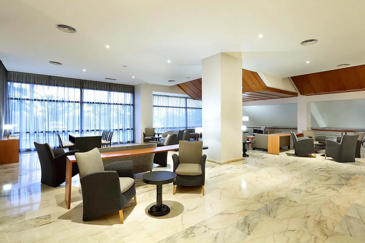 Communal lounge/ TV room in Exe Isla Cartuja