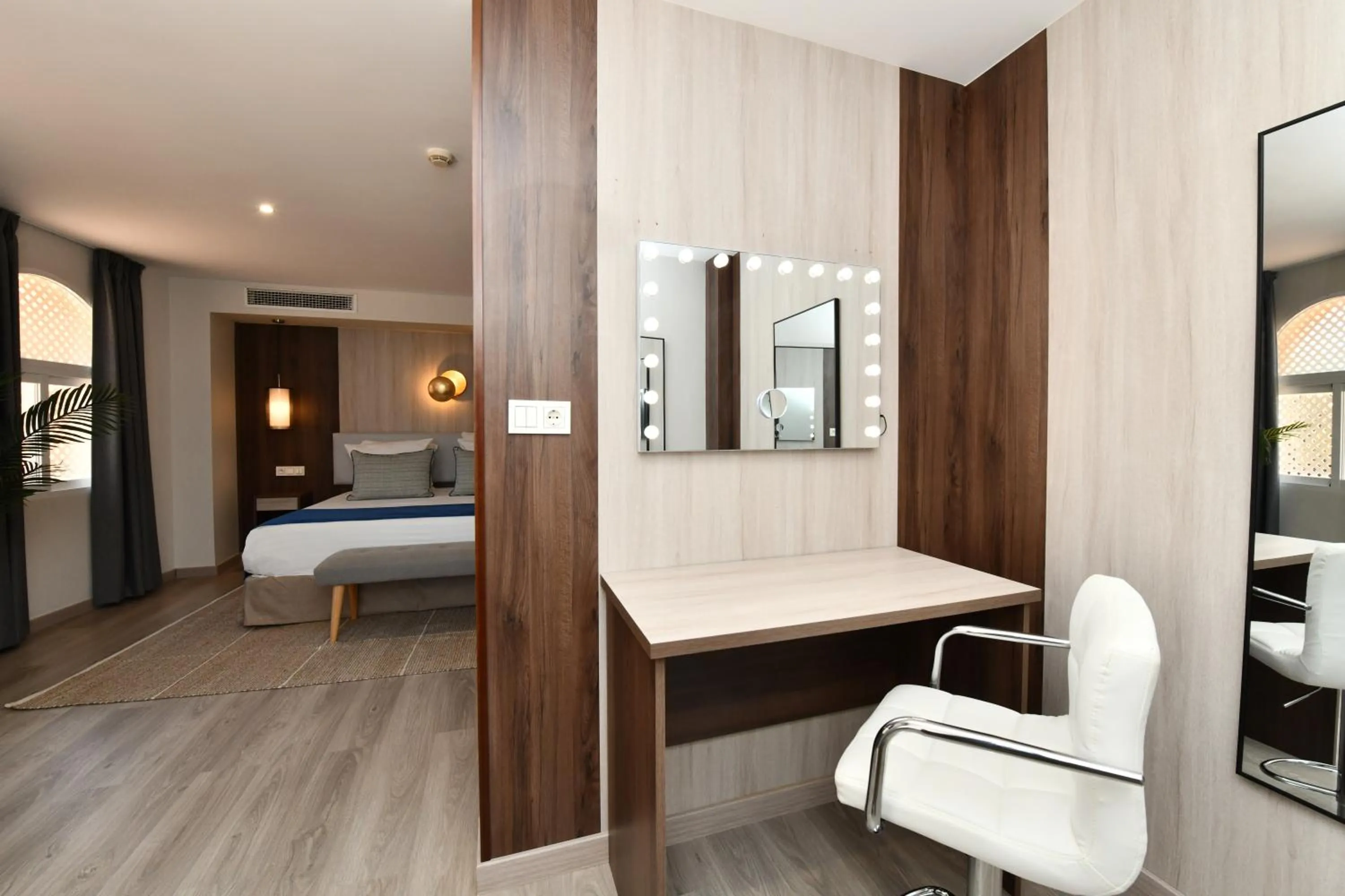 Bed in Hotel Salobreña Suites