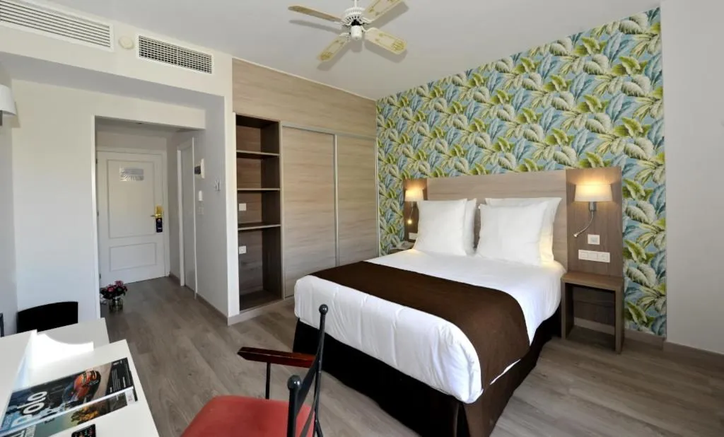 Bed in Hotel Salobreña Suites