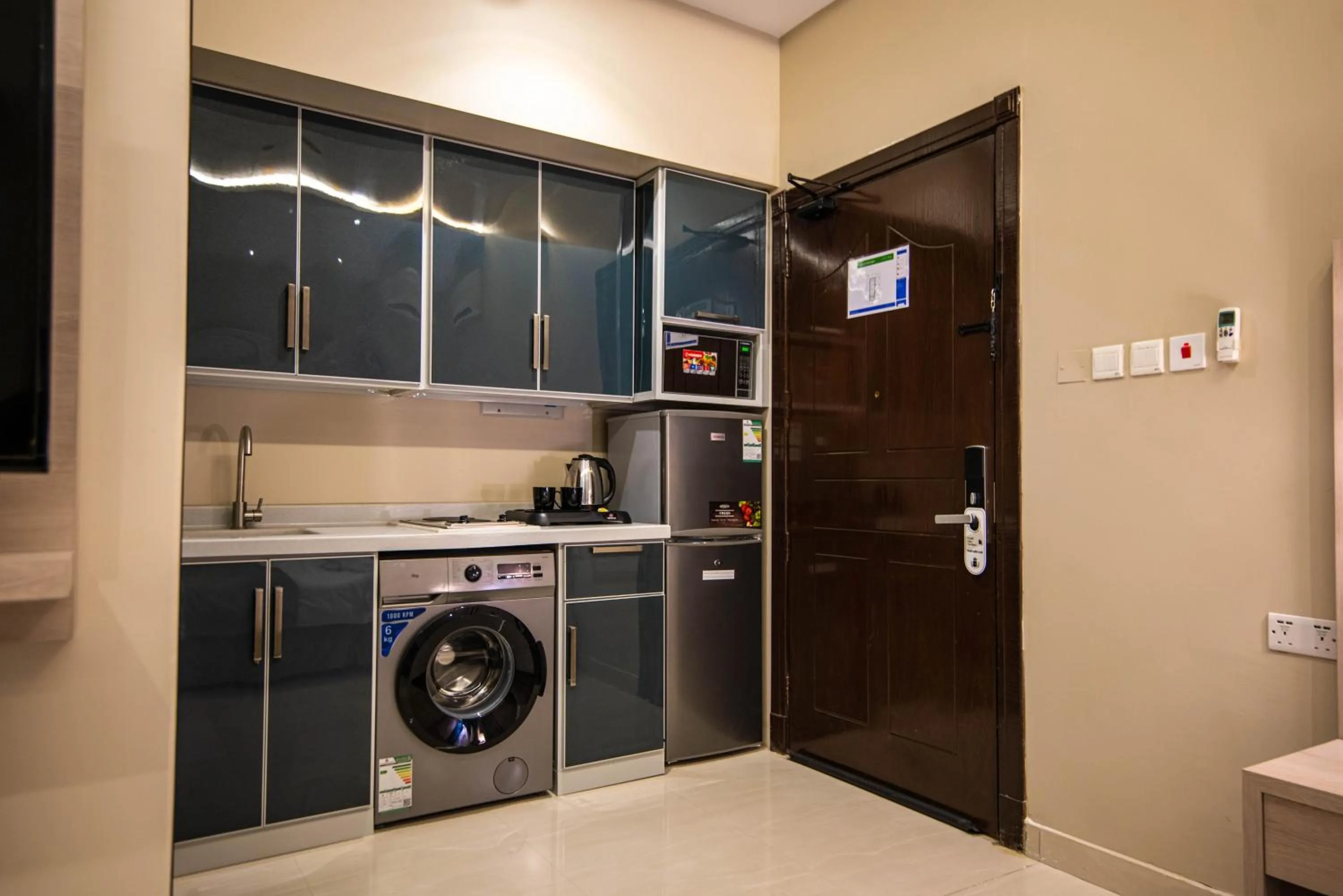 Kitchen or kitchenette in غرناطة بالاس ان للشقق المخدومة