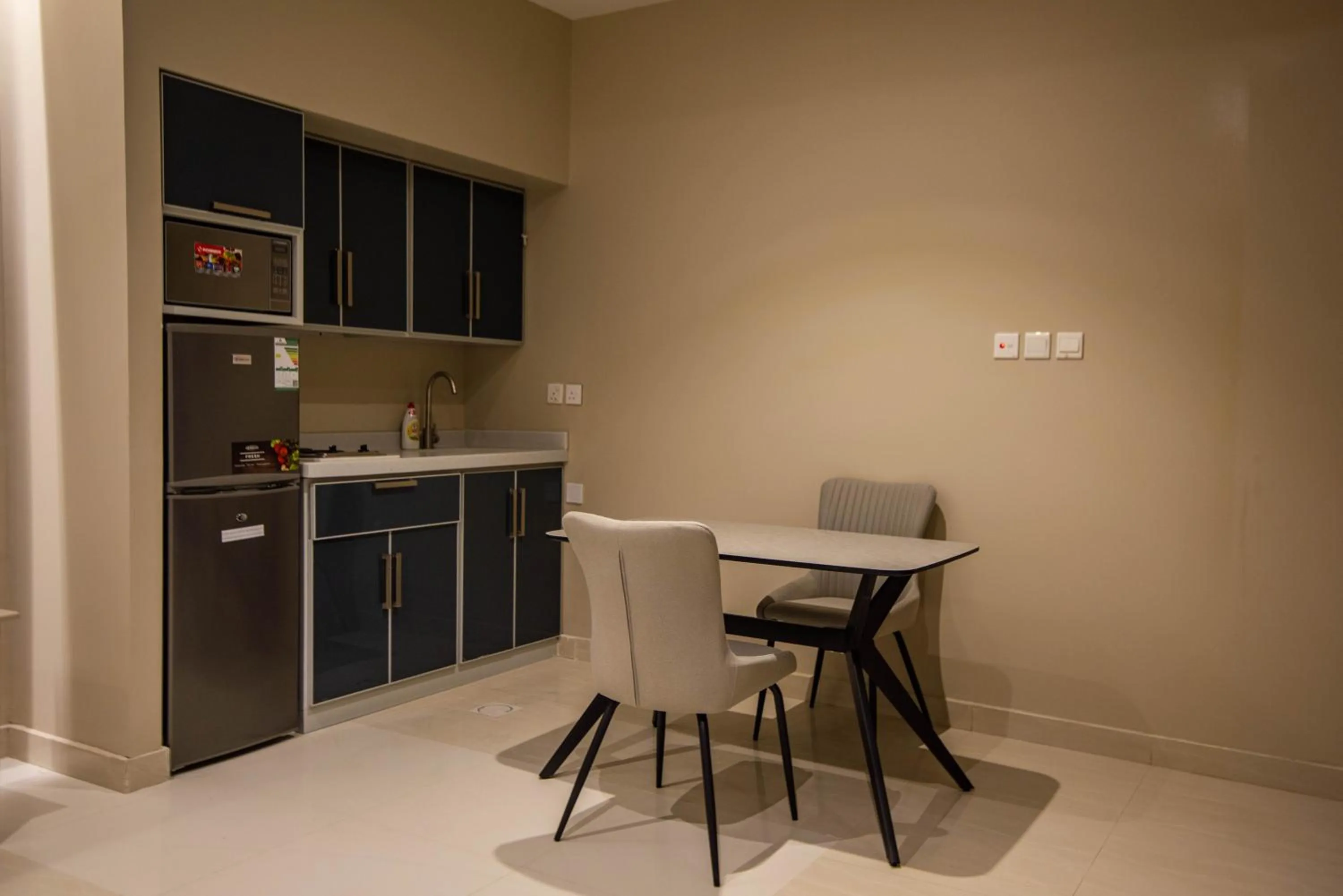Kitchen or kitchenette in غرناطة بالاس ان للشقق المخدومة