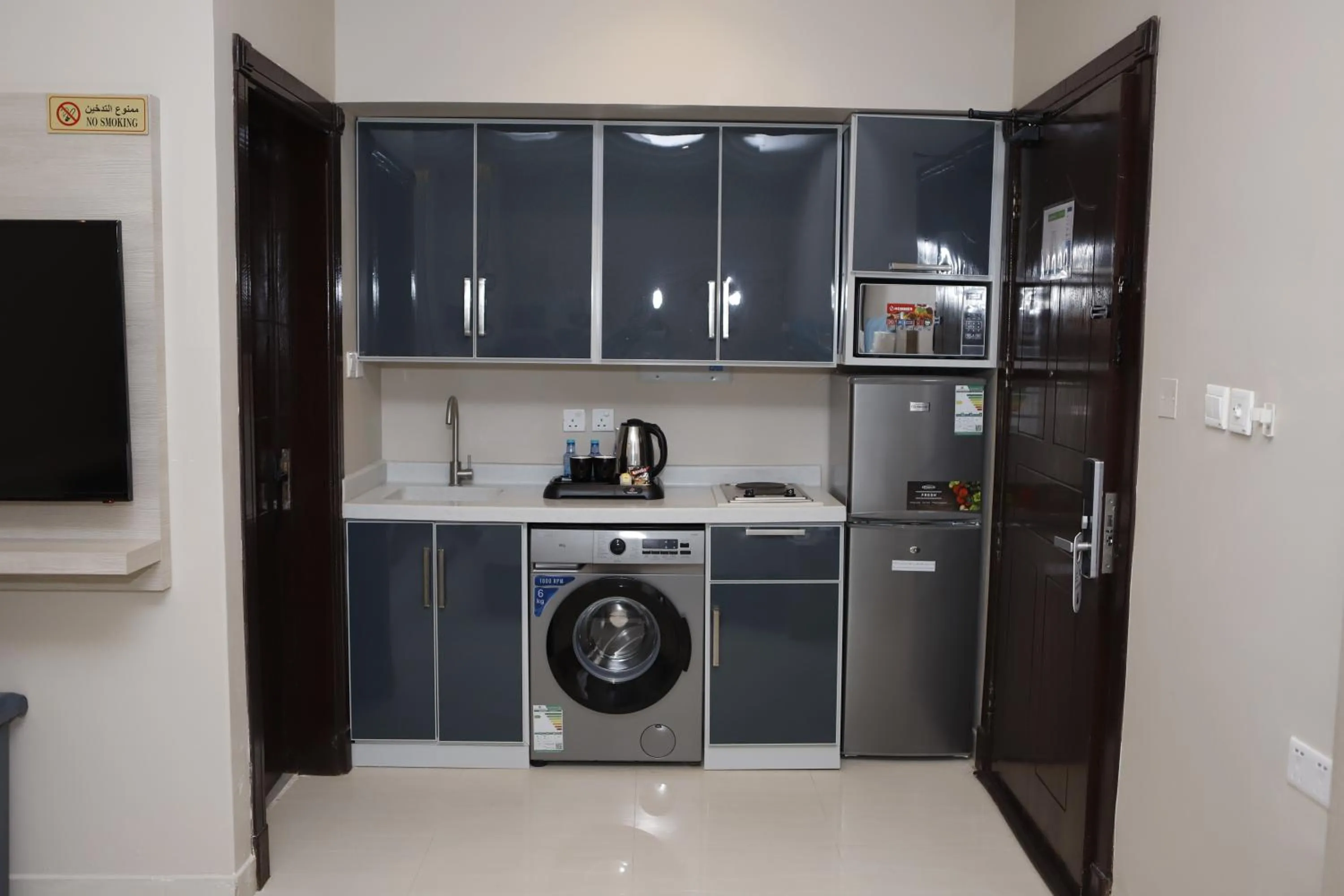 Kitchen or kitchenette in غرناطة بالاس ان للشقق المخدومة