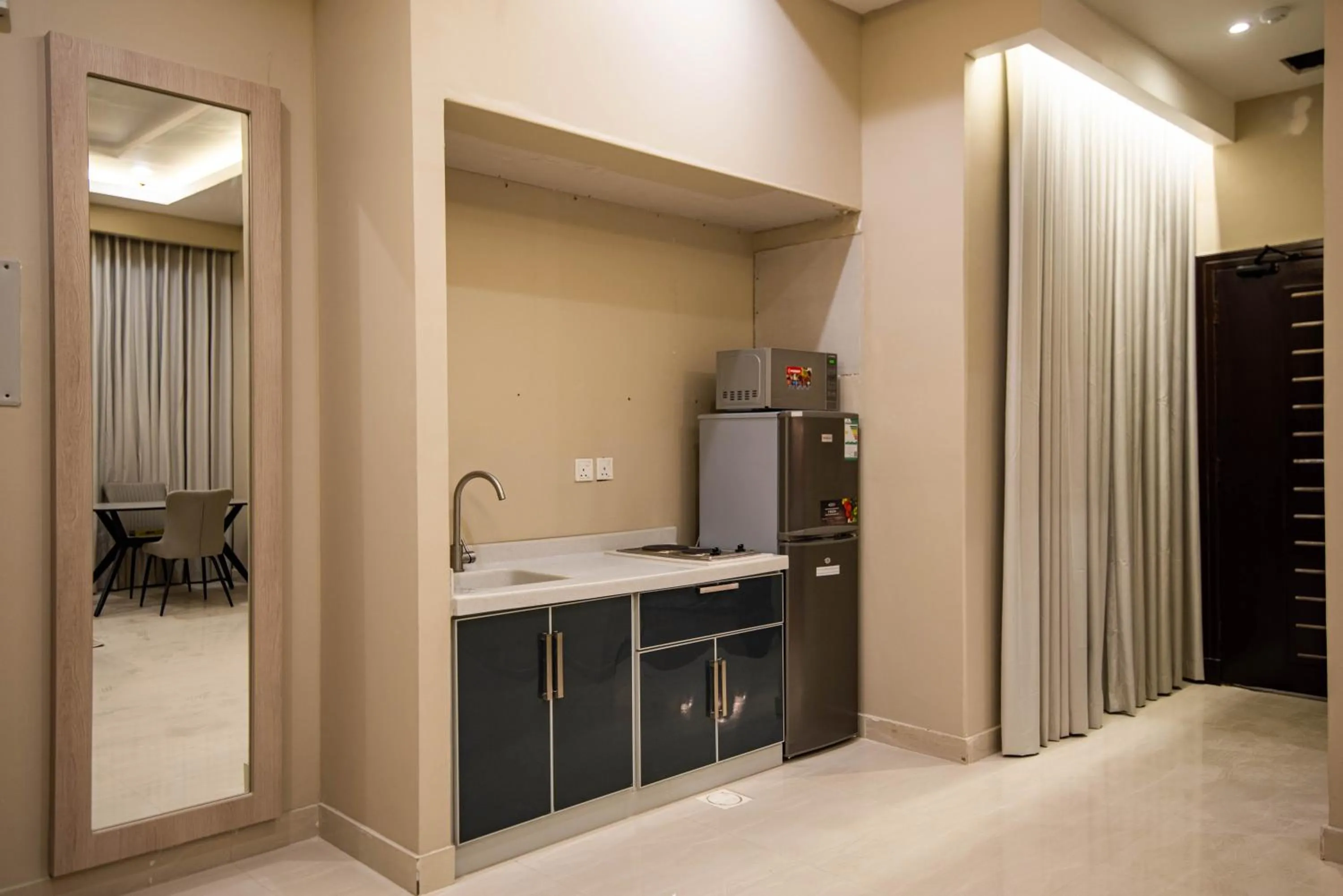 Kitchen or kitchenette in غرناطة بالاس ان للشقق المخدومة