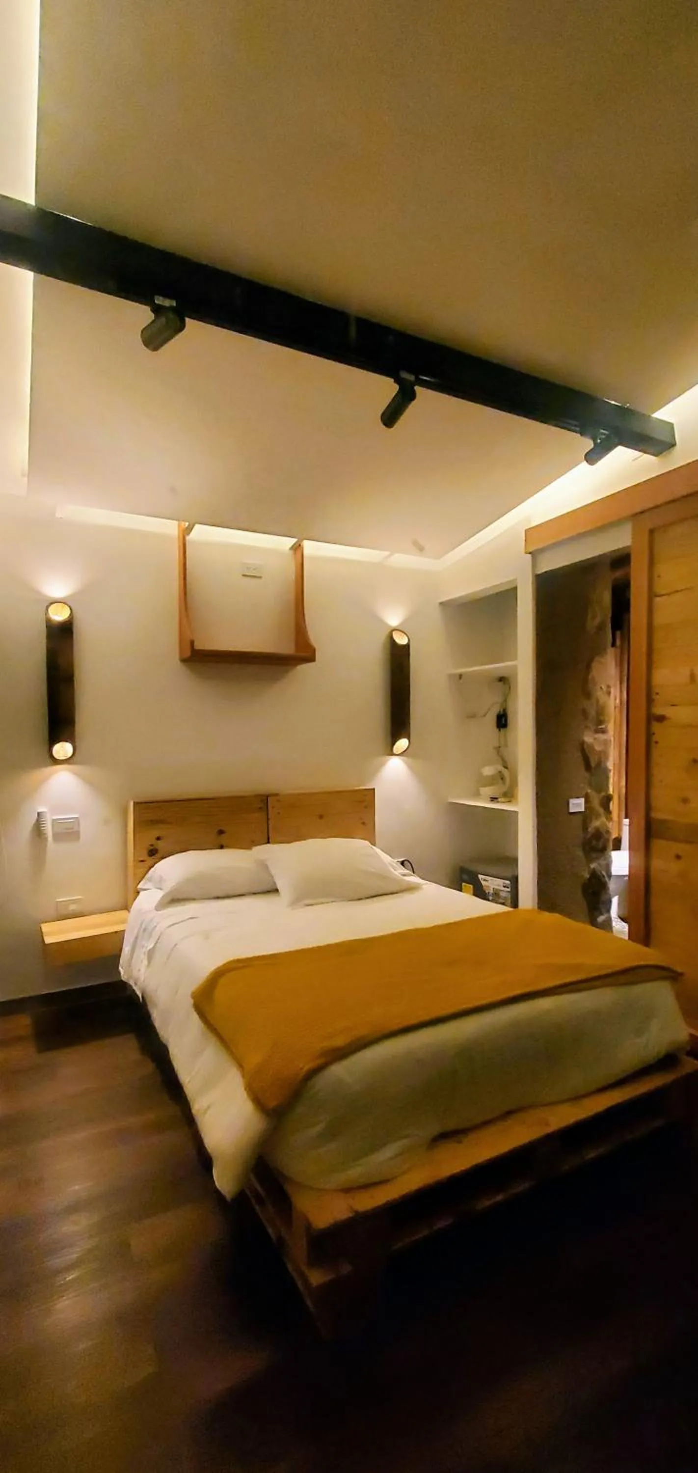 Bed in Ecohotel Alma