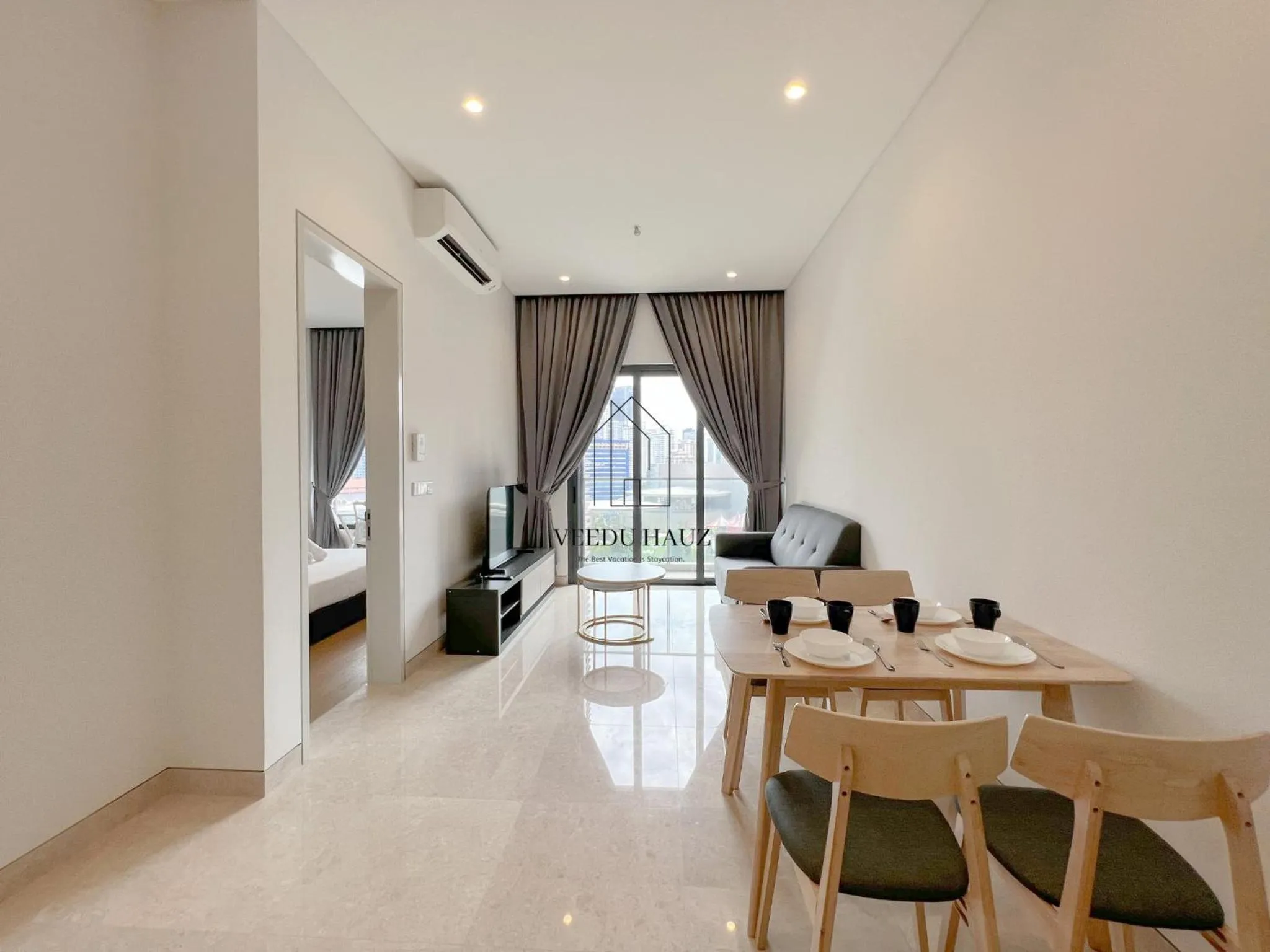 Living room in Lucentia Residences BBCC at Lalaport Kuala Lumpur by Veedu Hauz