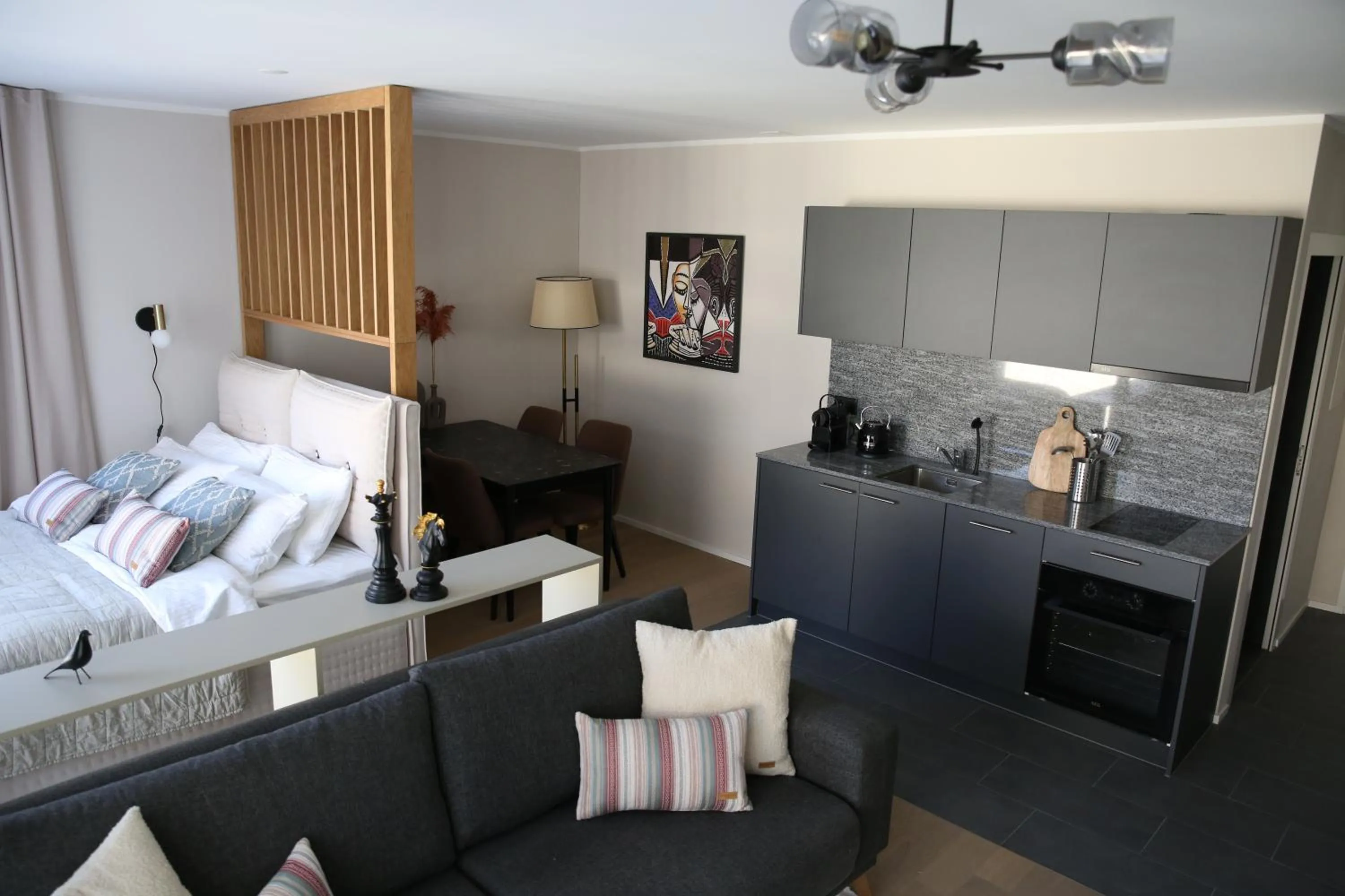 Seating area, Bed in Lamira Serviced Apartments Zurich City
